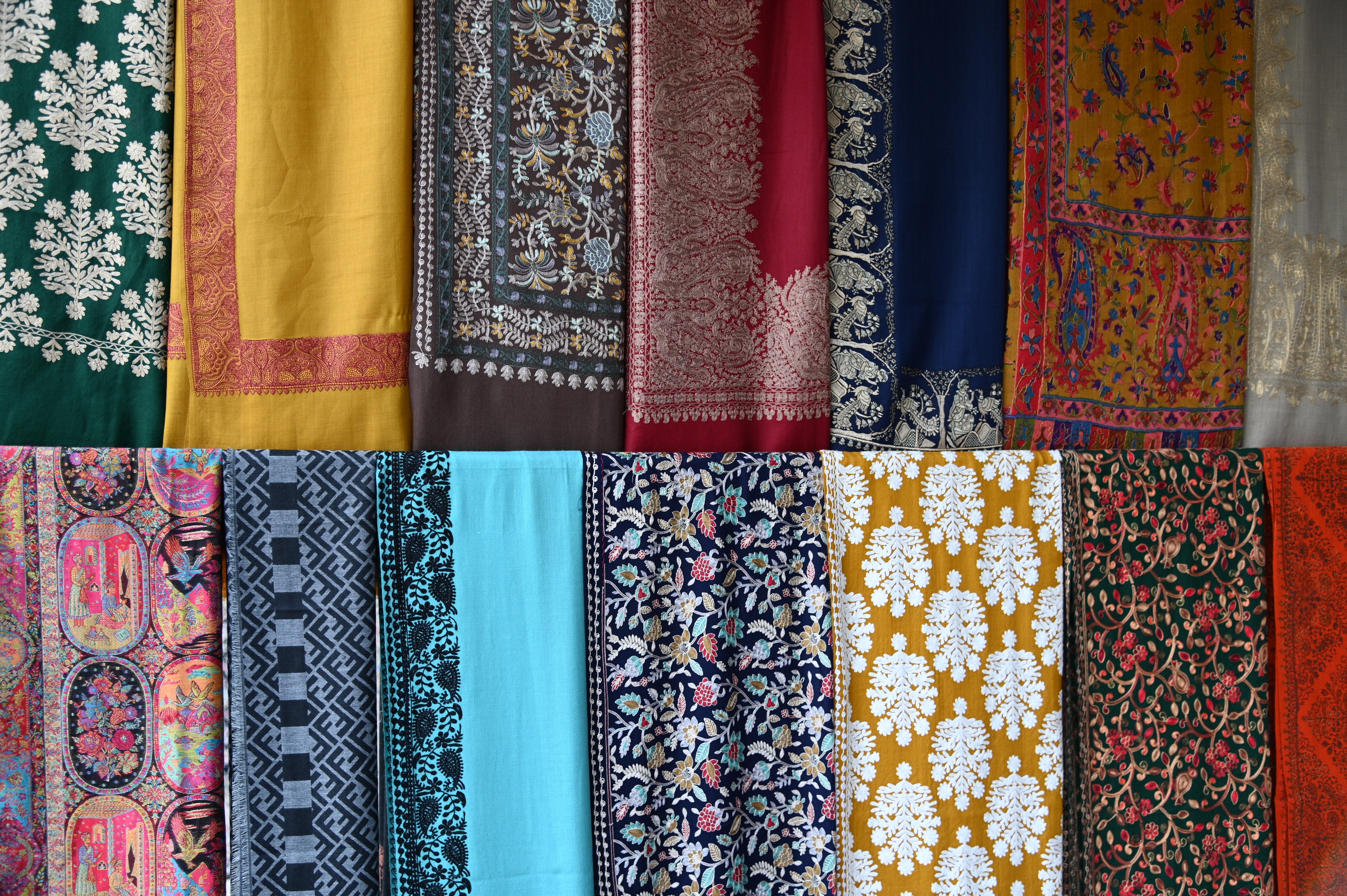 Colorful collection of woolen shawls :the best quality shawls made from Pashm or Pashmina in Kashmir