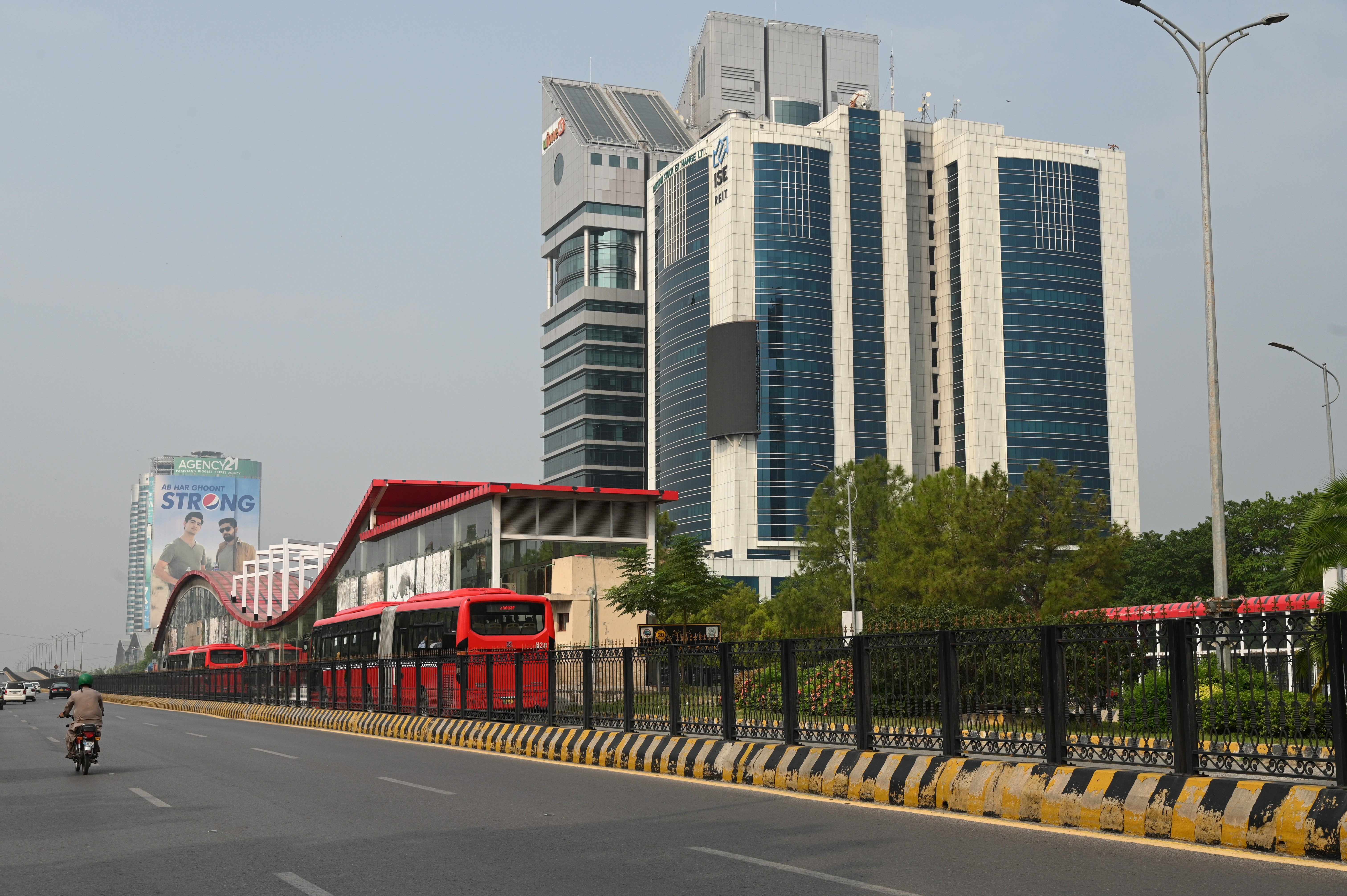 beautiful view of high rise buildings in blue area along with the metro track