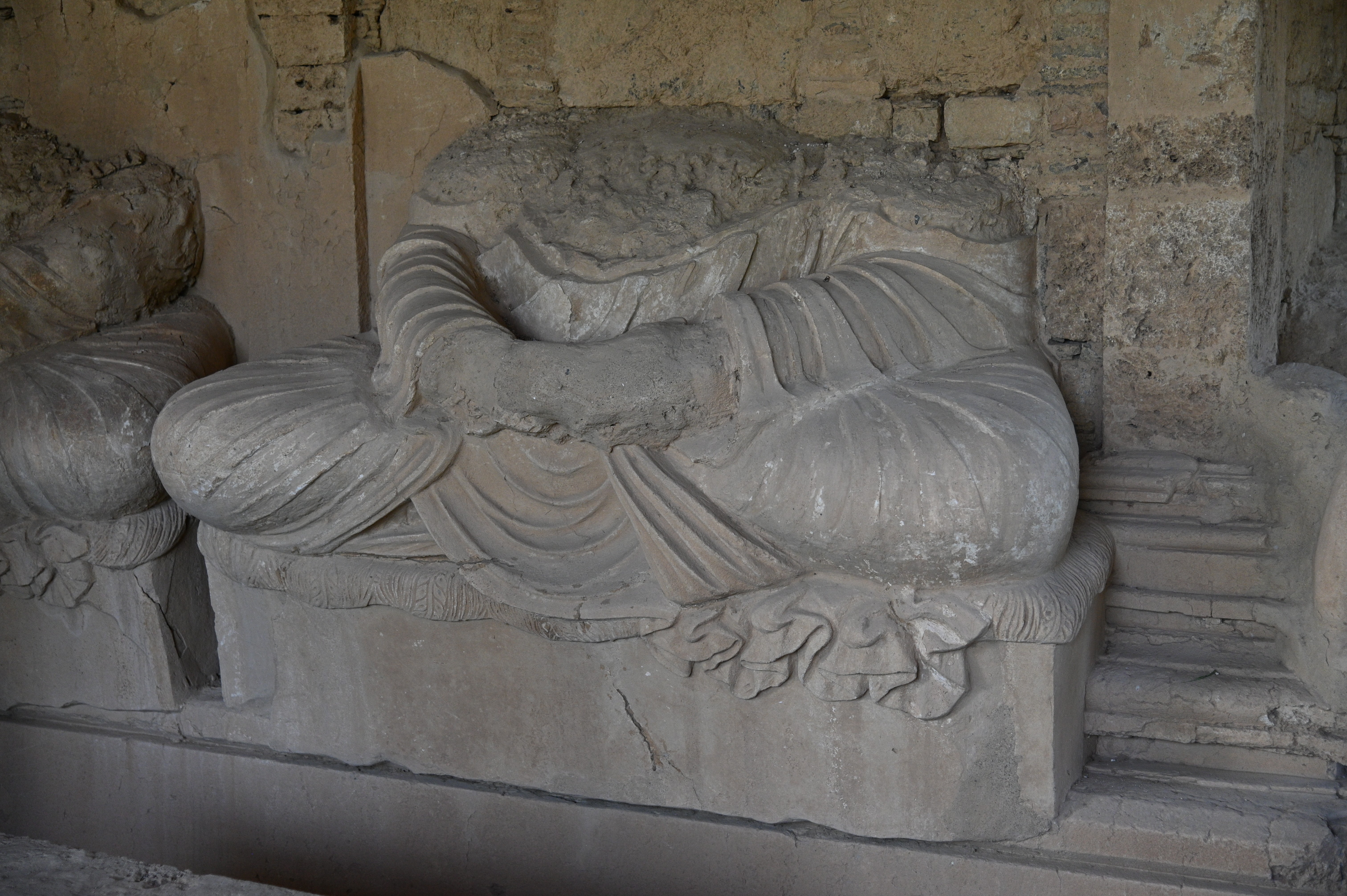 stucco sculpture of buddha