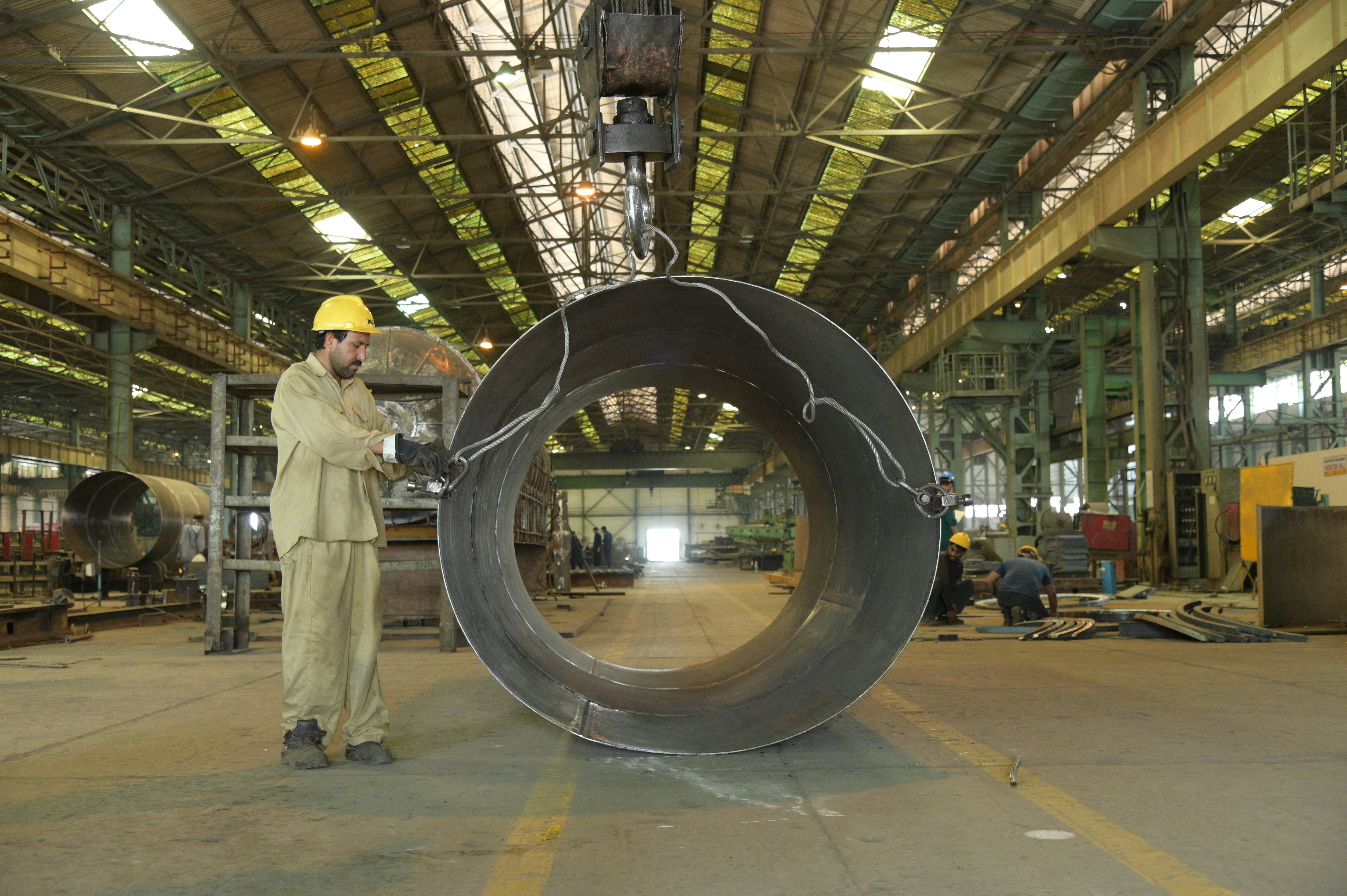 A worker working in HMC Industry