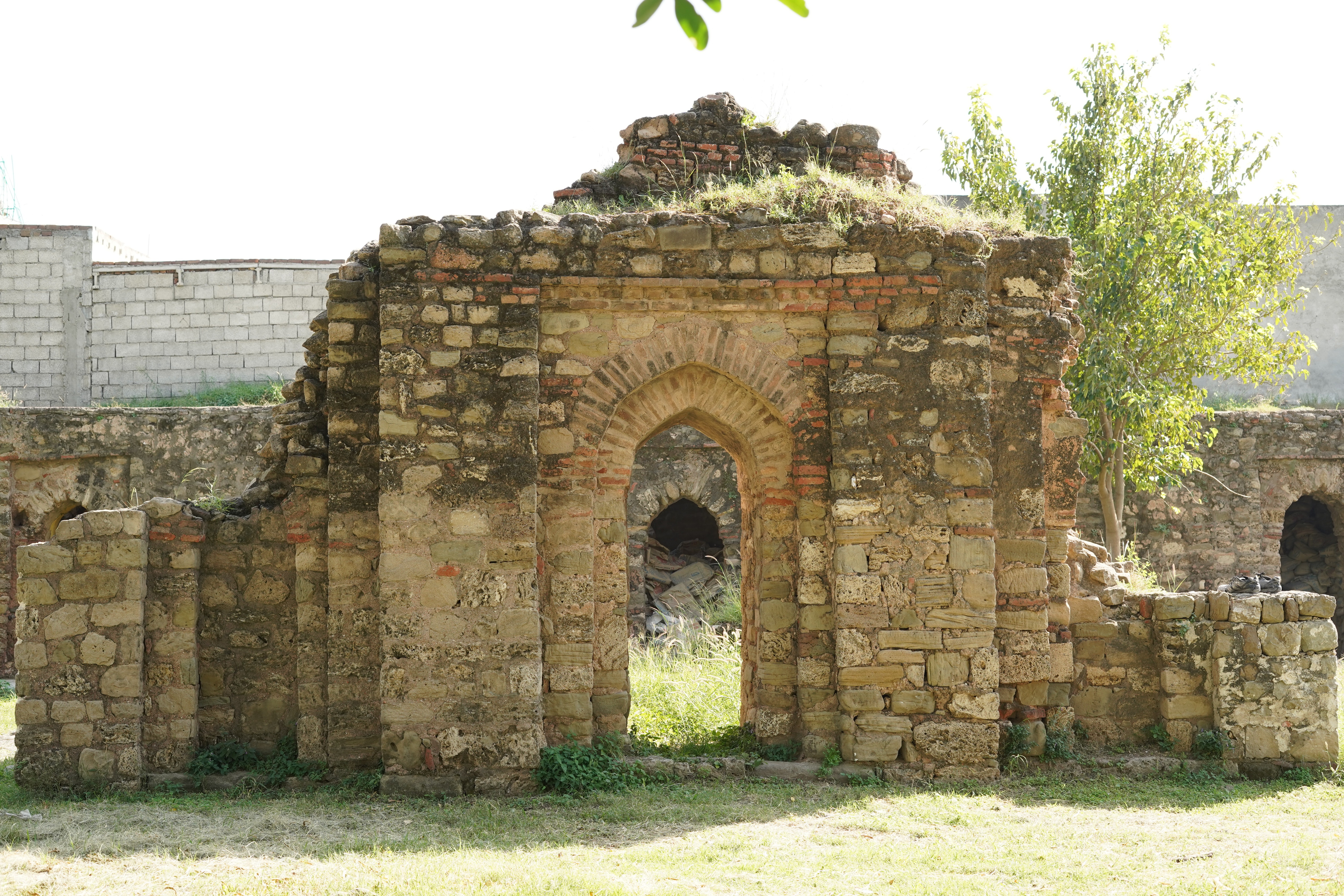 The deteriorated outer wall of doorway to Rawat Fort