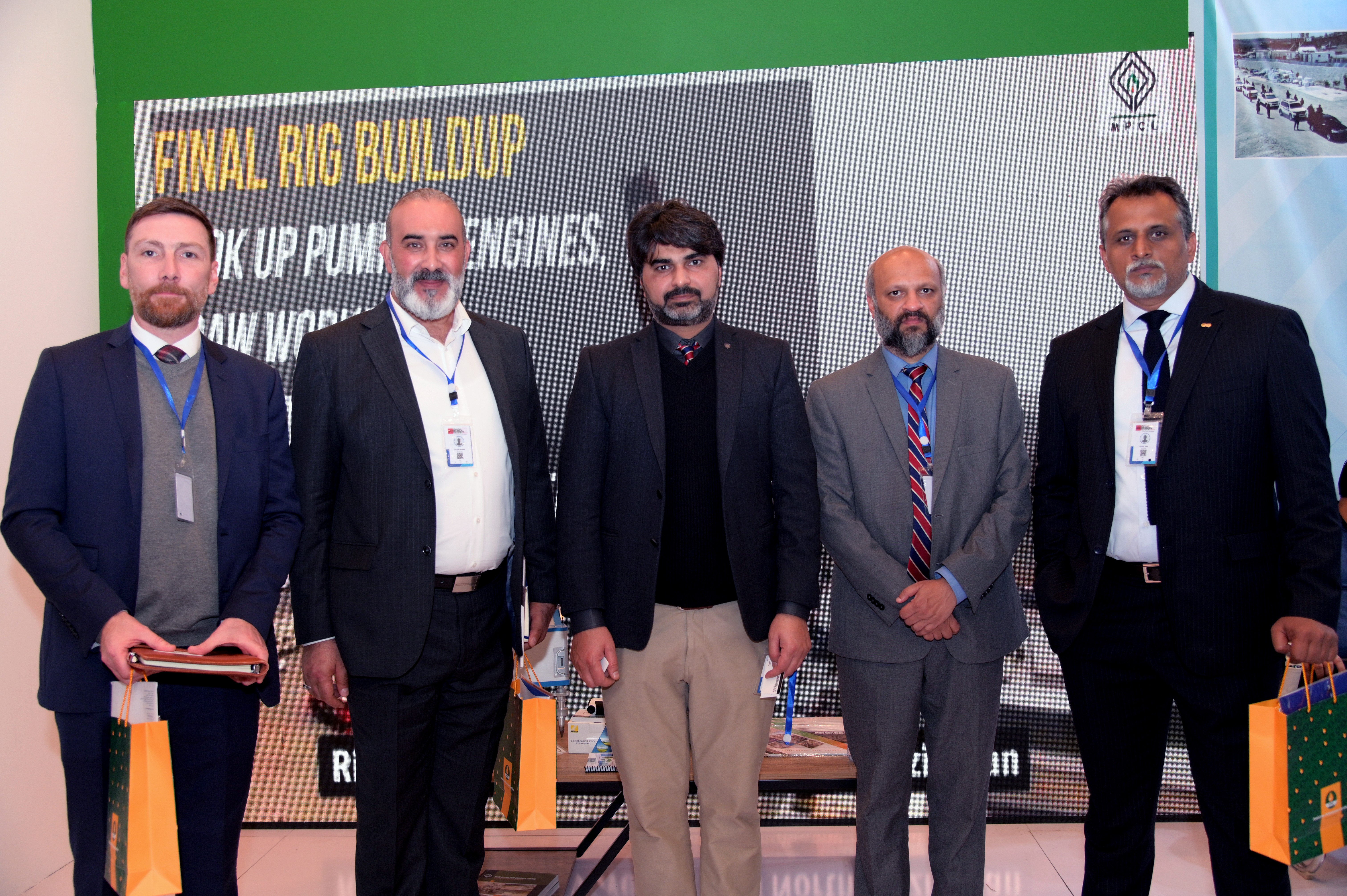 A group photo of engineers from different branches at an event in Sarena Hotel