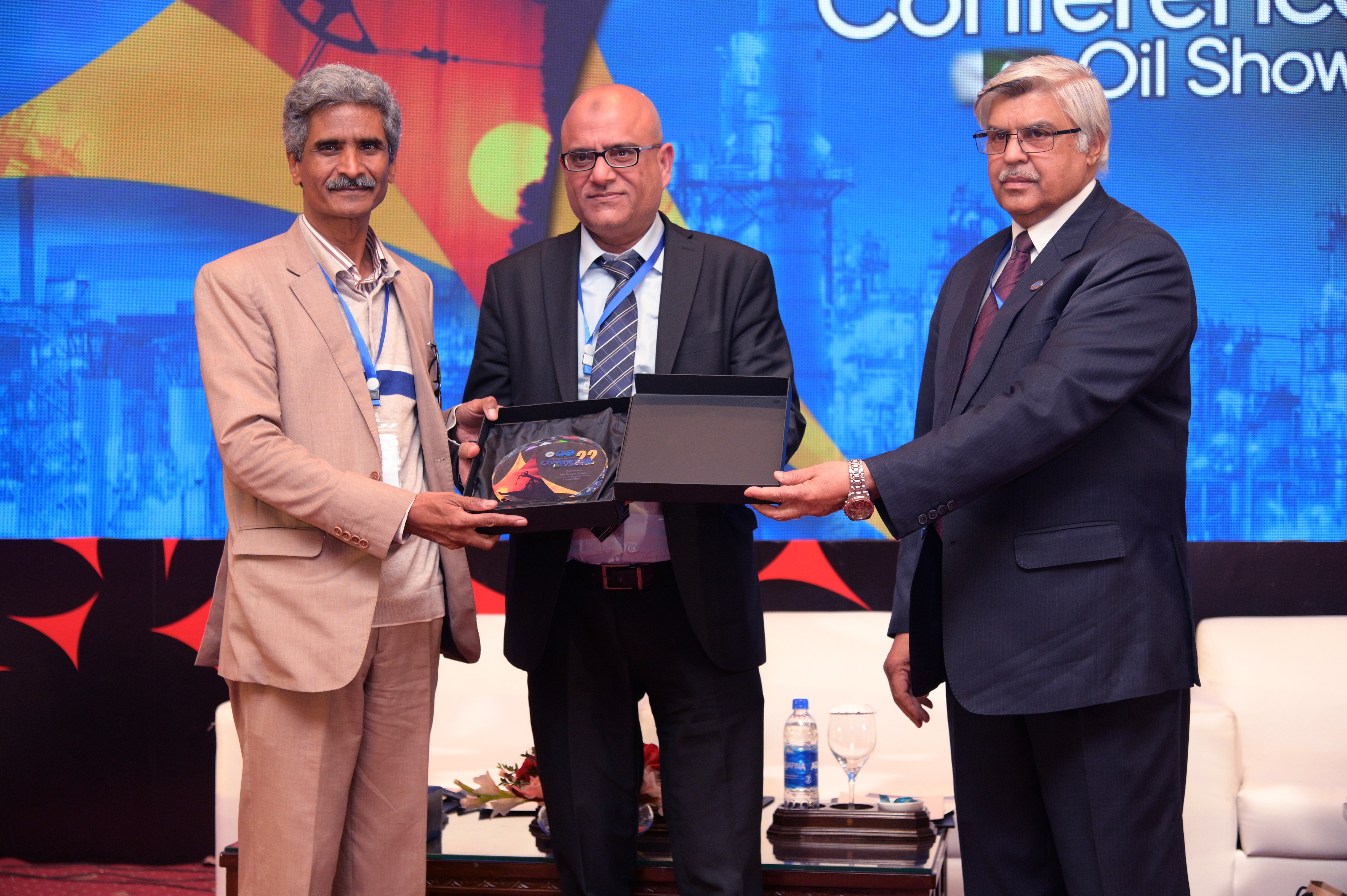 Shields distribution ceremony to the participants at the event of conference and oil show