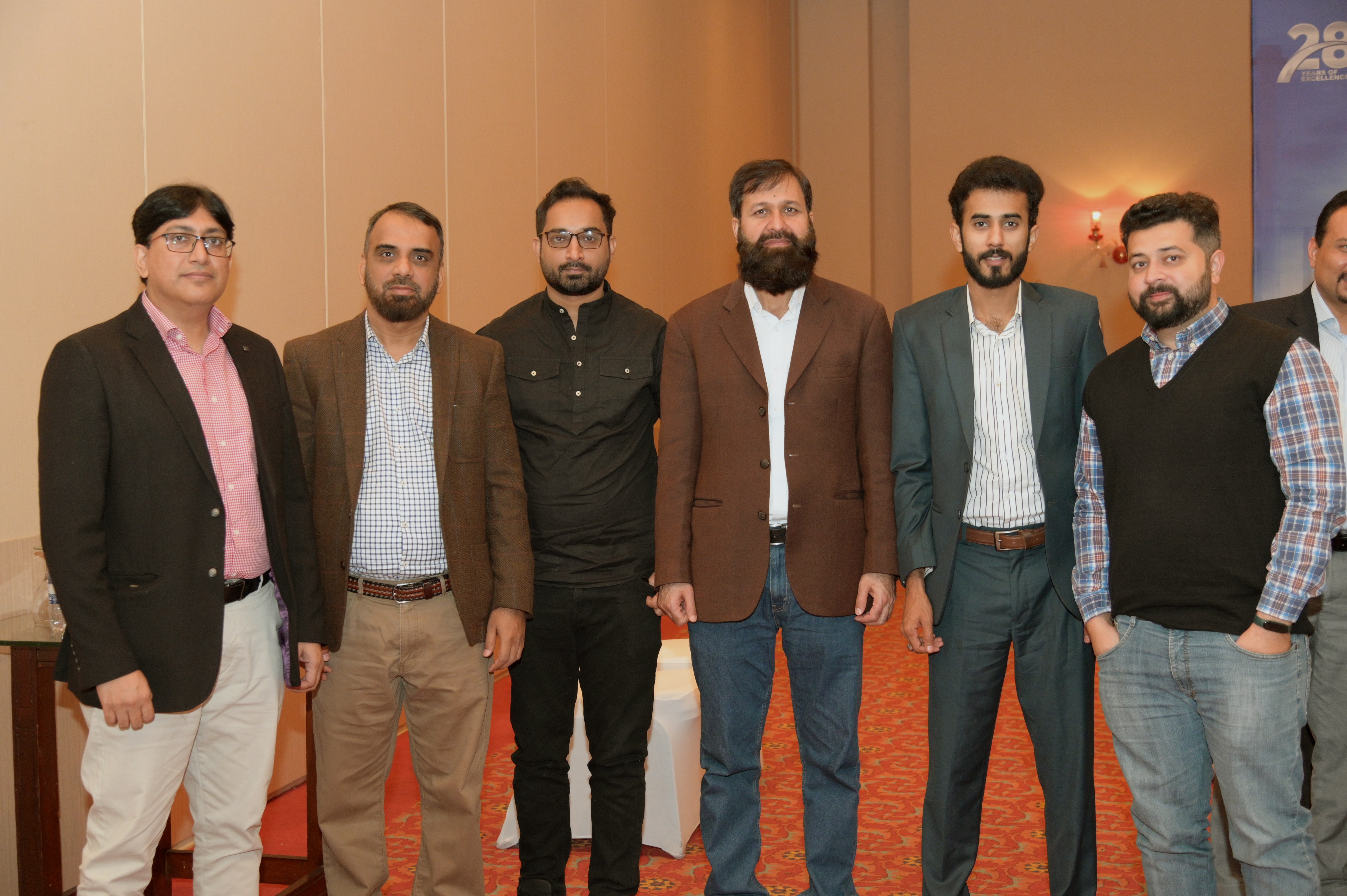 A group photo of participants in Sarena hotel on the event of 28th annual technical conference and oil show