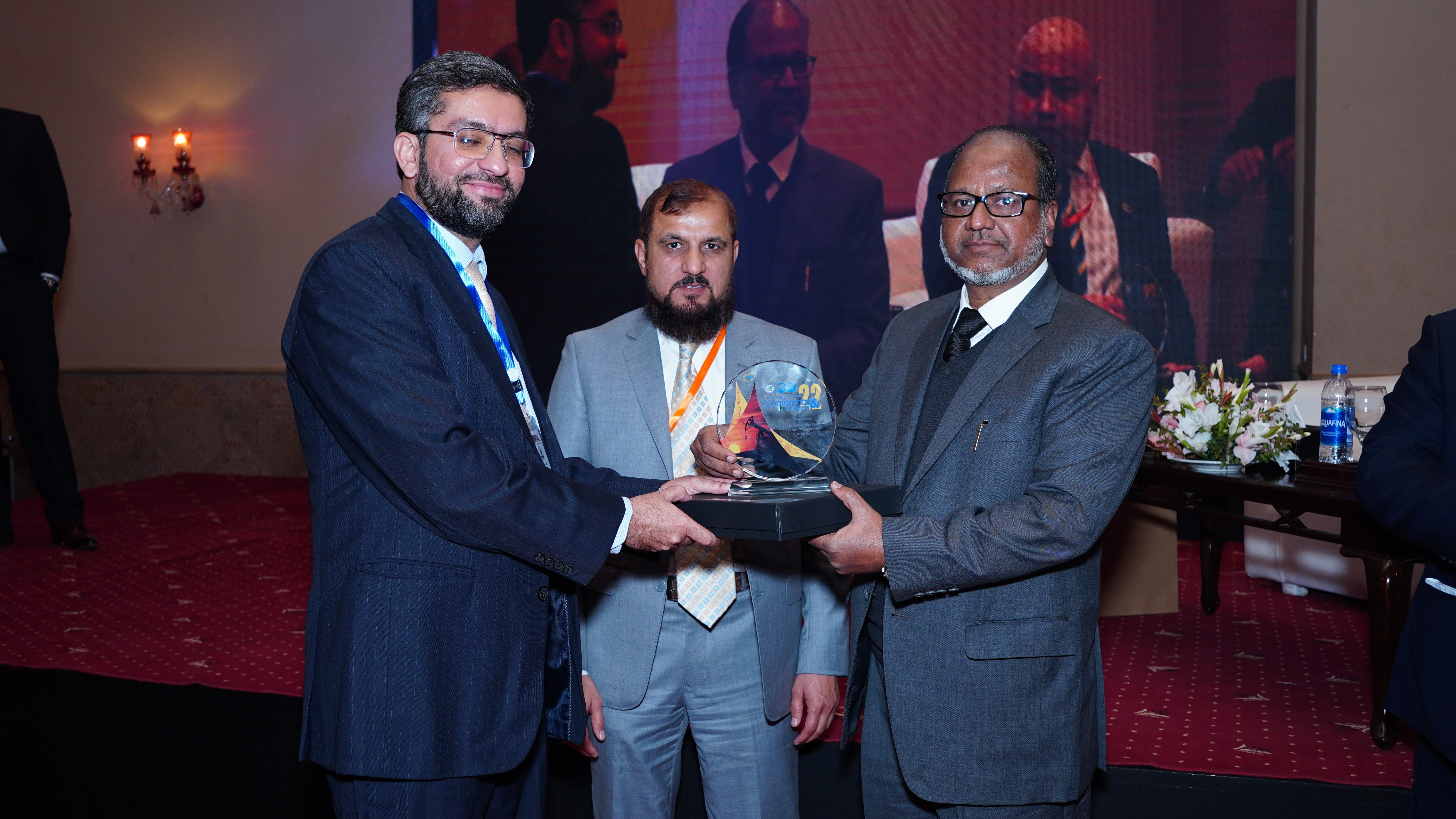 Shields distribution ceremony to the participants at the event of conference and oil show