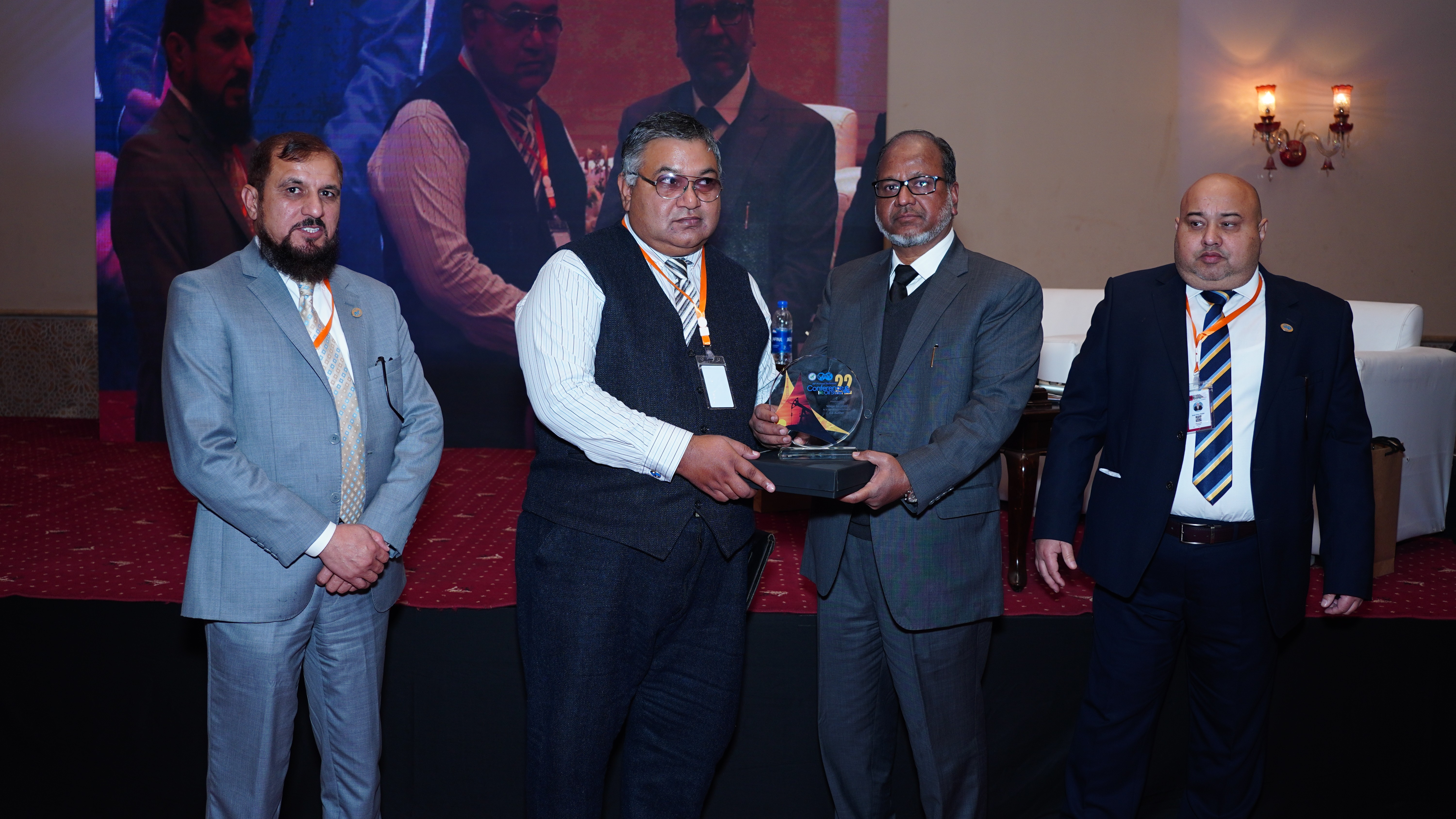 Shields distribution ceremony to the participants at the event of conference and oil show