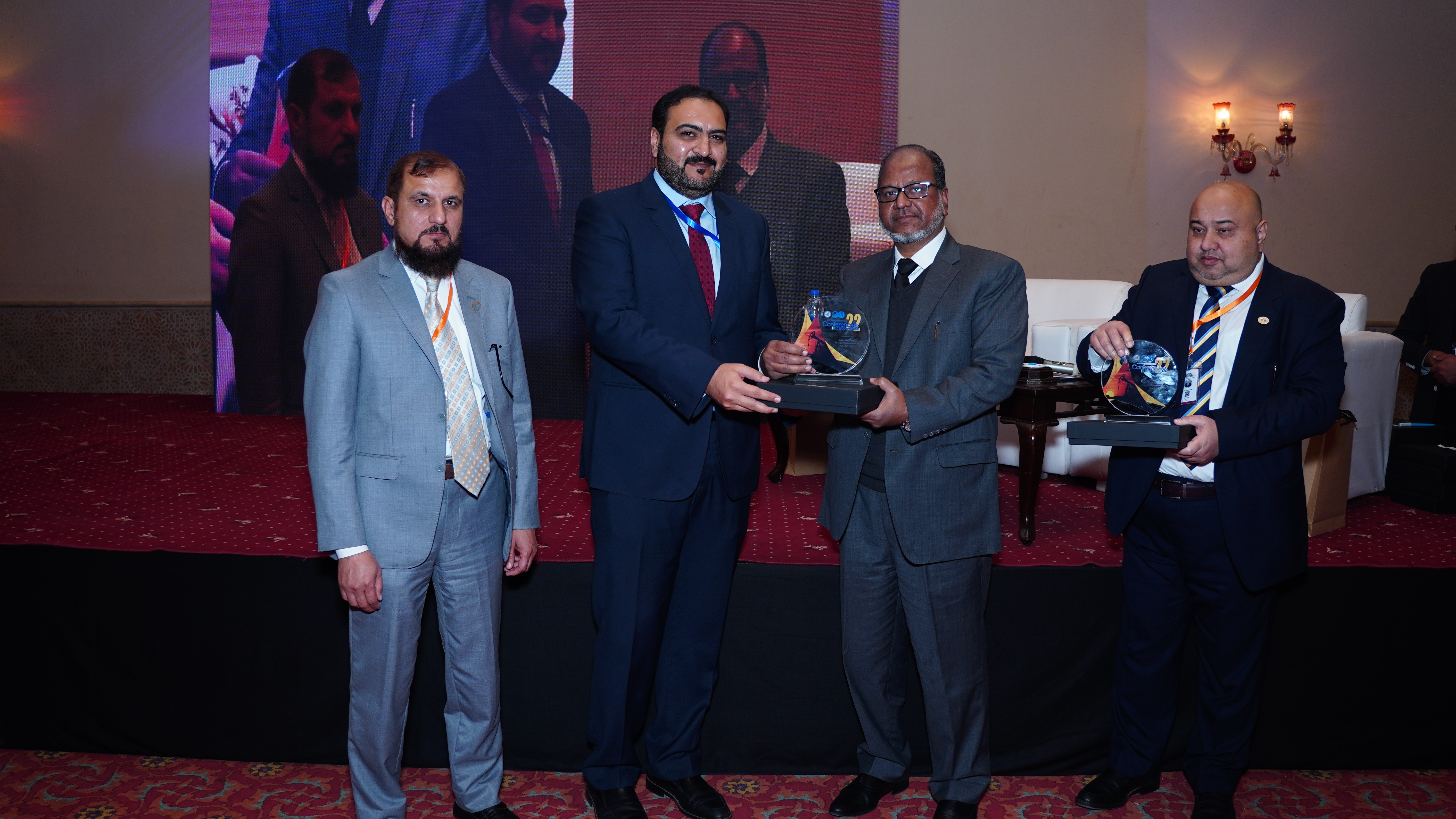 Shields distribution ceremony to the participants at the event of conference and oil show