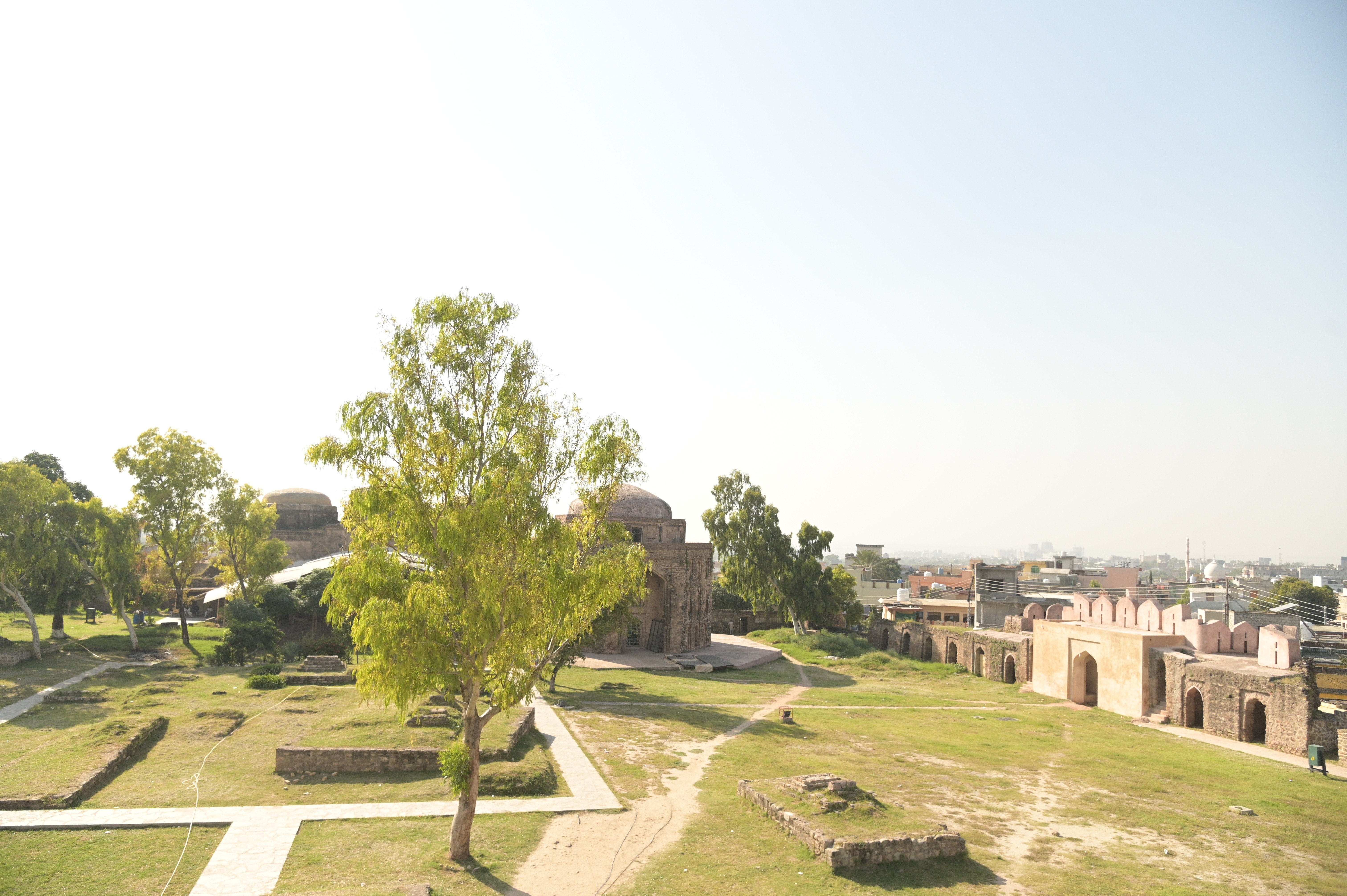 An aerial exterior view of tomb like building in Rawat Fort