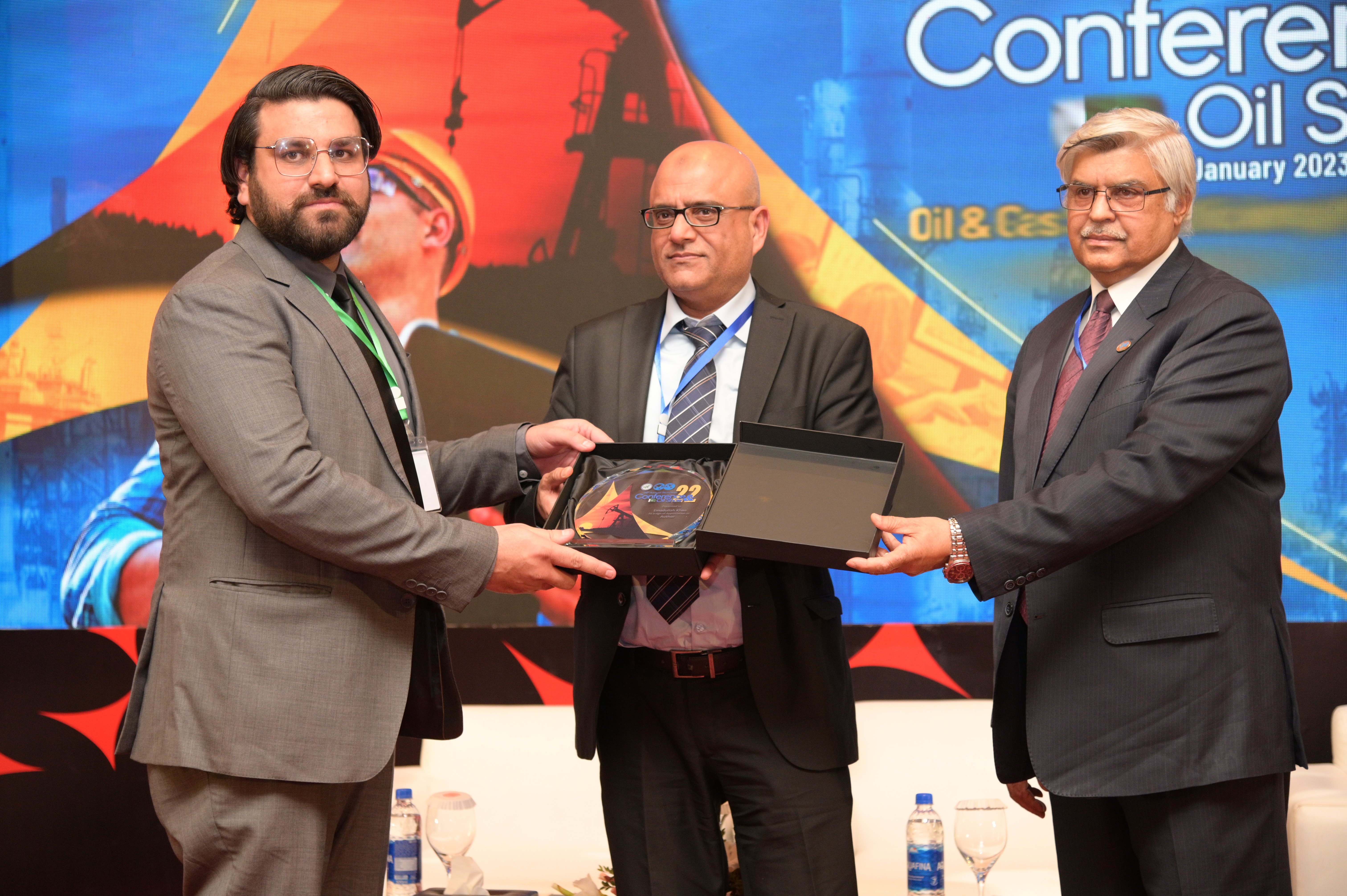 Shields distribution ceremony to the cooperate members at the event of conference and oil show