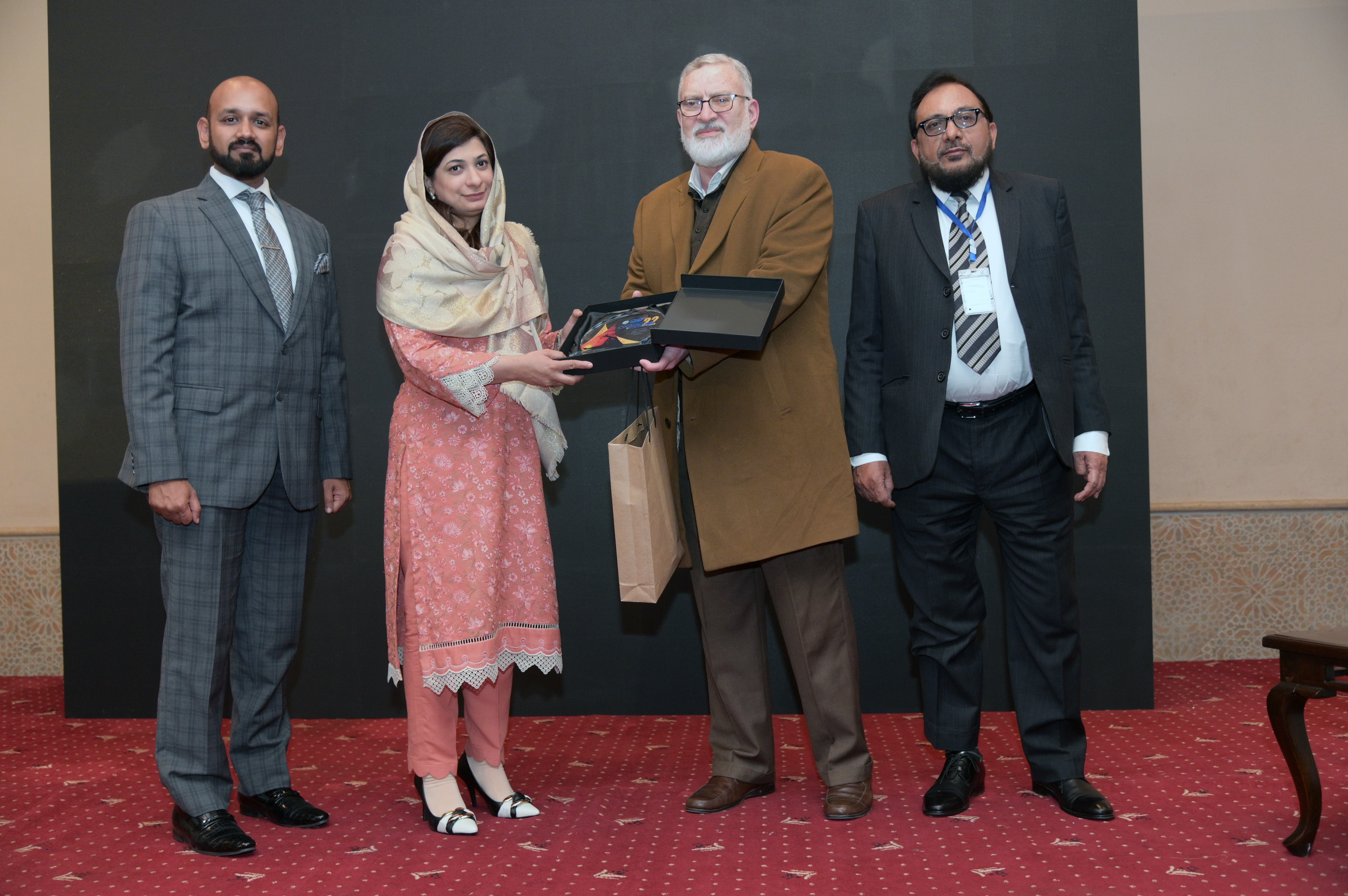 Shields distribution ceremony to the participants at the event of conference and oil show