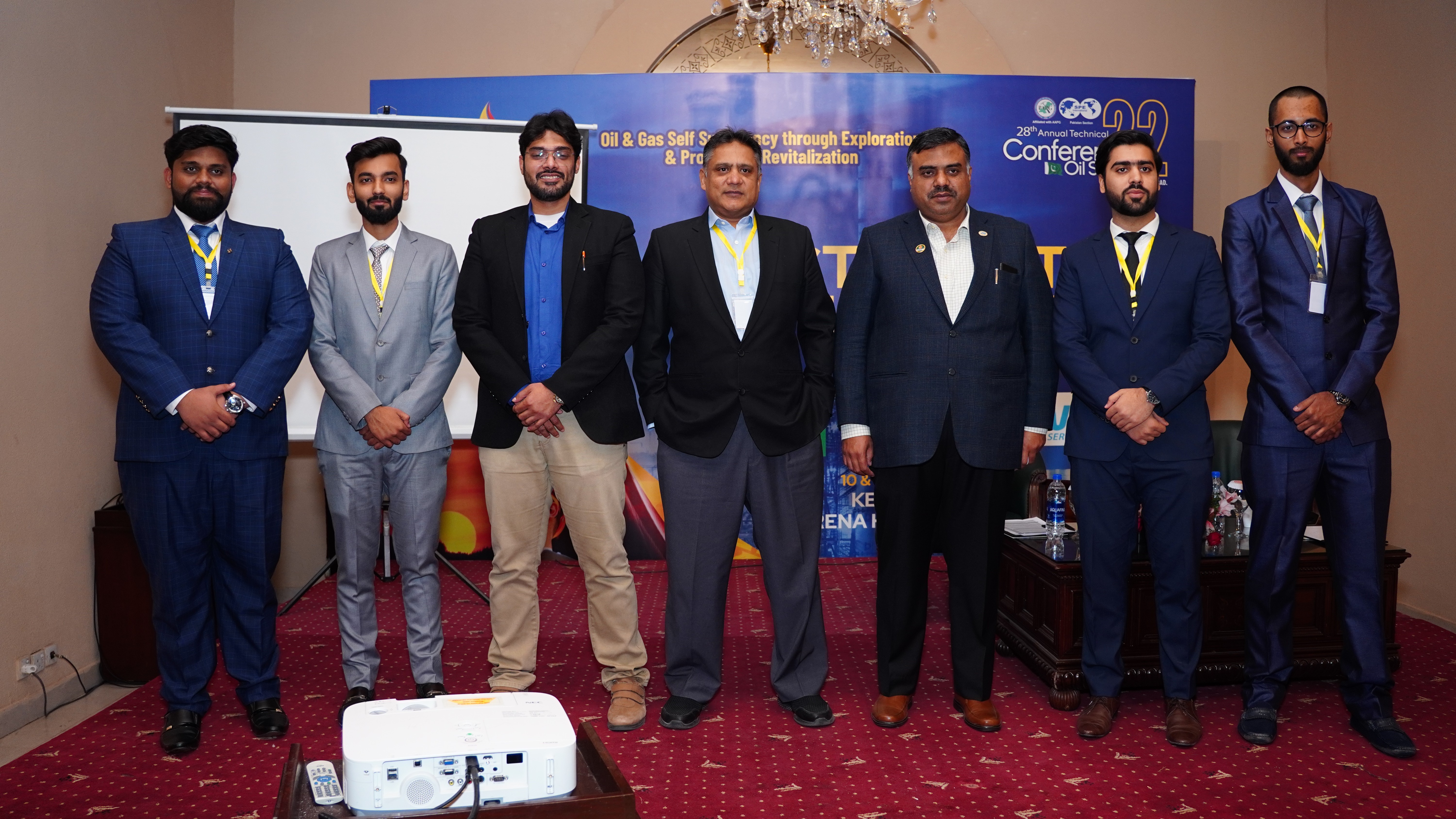 The group photo of the students and the presenters with chief guests at oil conference show