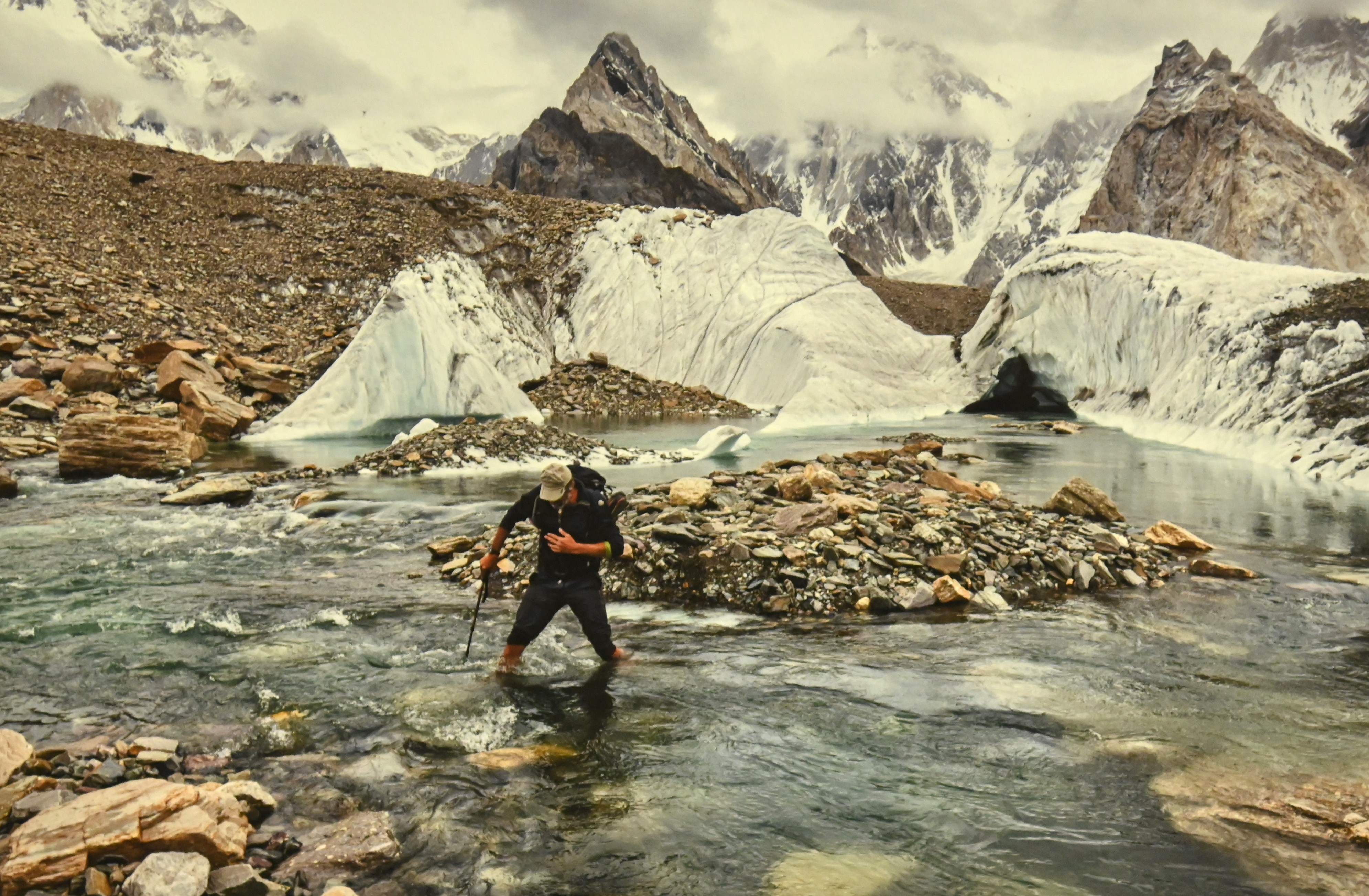 A volunteer collecting  plastic waste from the mountain region to keep it clean