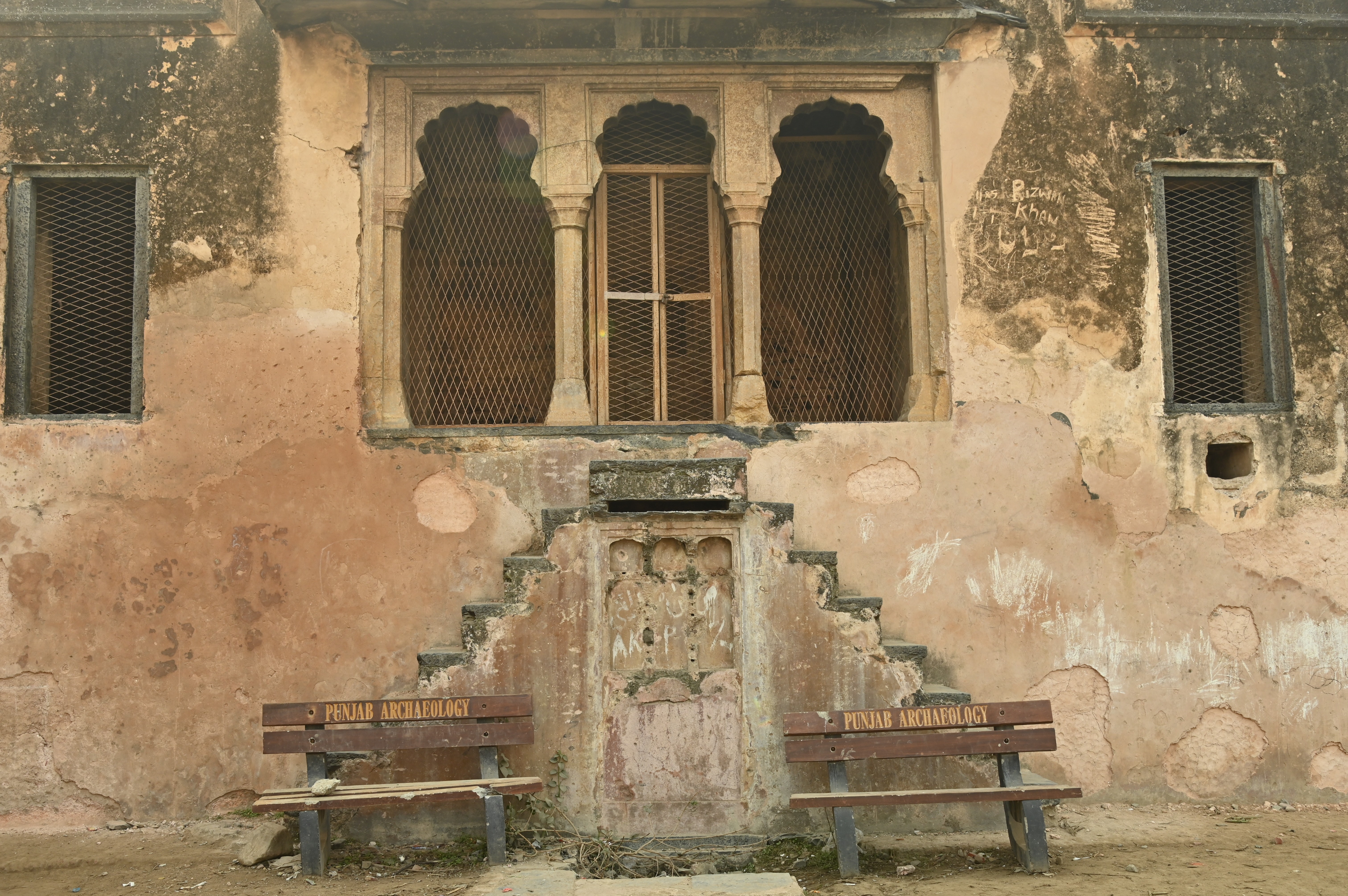 The fading colors of the walls of Behram ki Baradari preserved by The Punjab Archaeology Department under the Antiquities Act 1975 of Pakistan