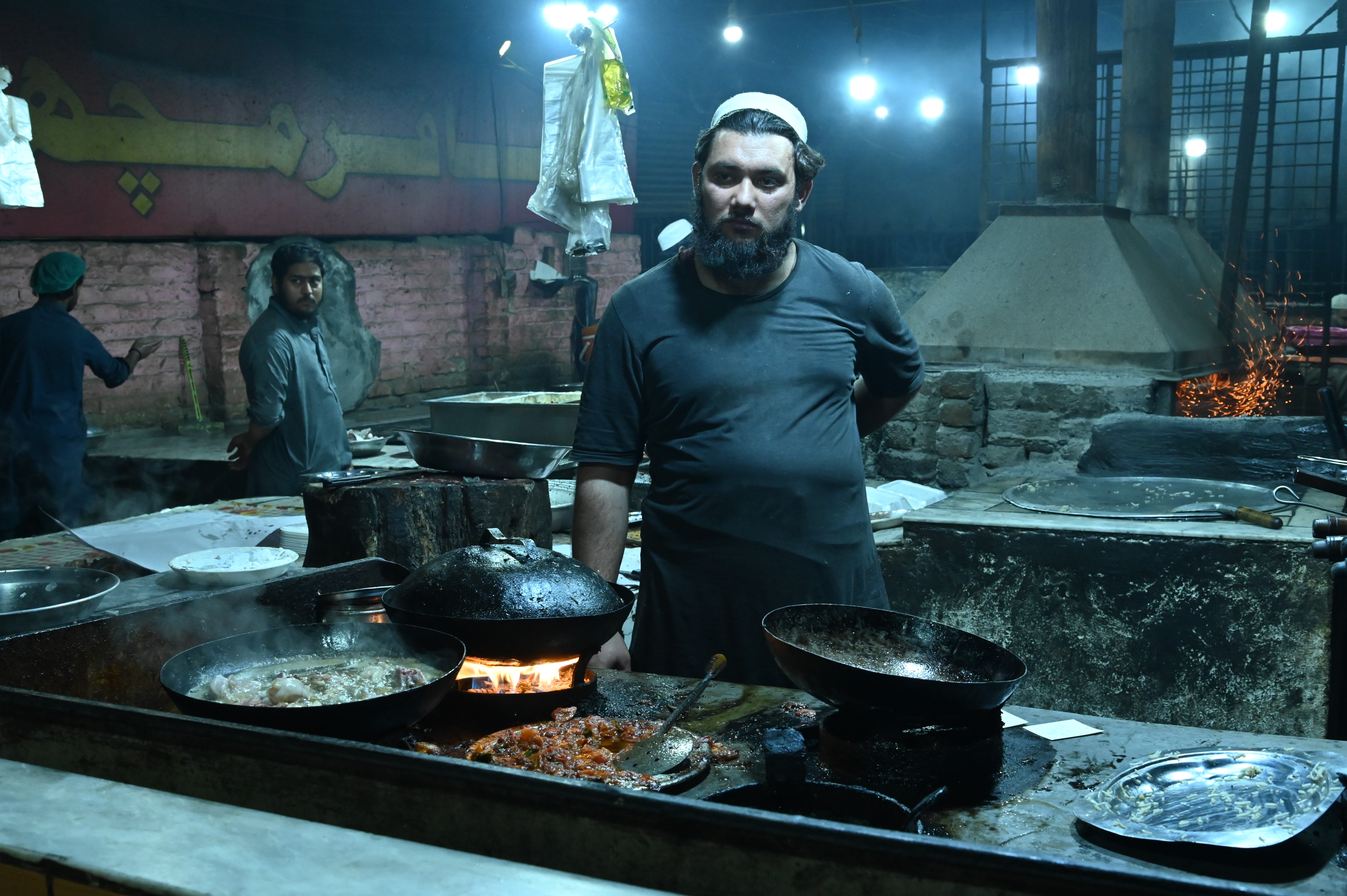 A man making delicious food over medium flame