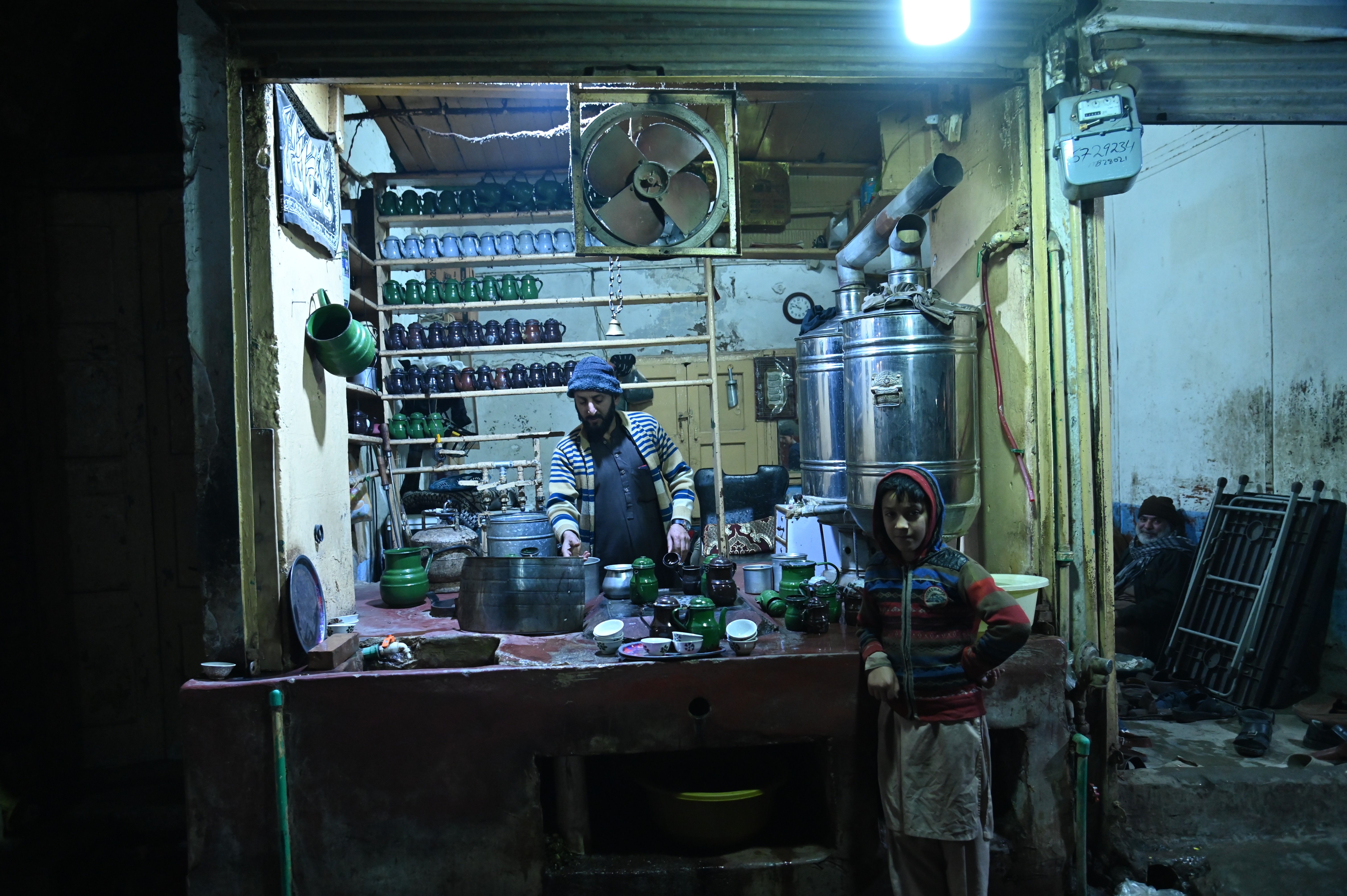 A man selling green tea in a local restaurant