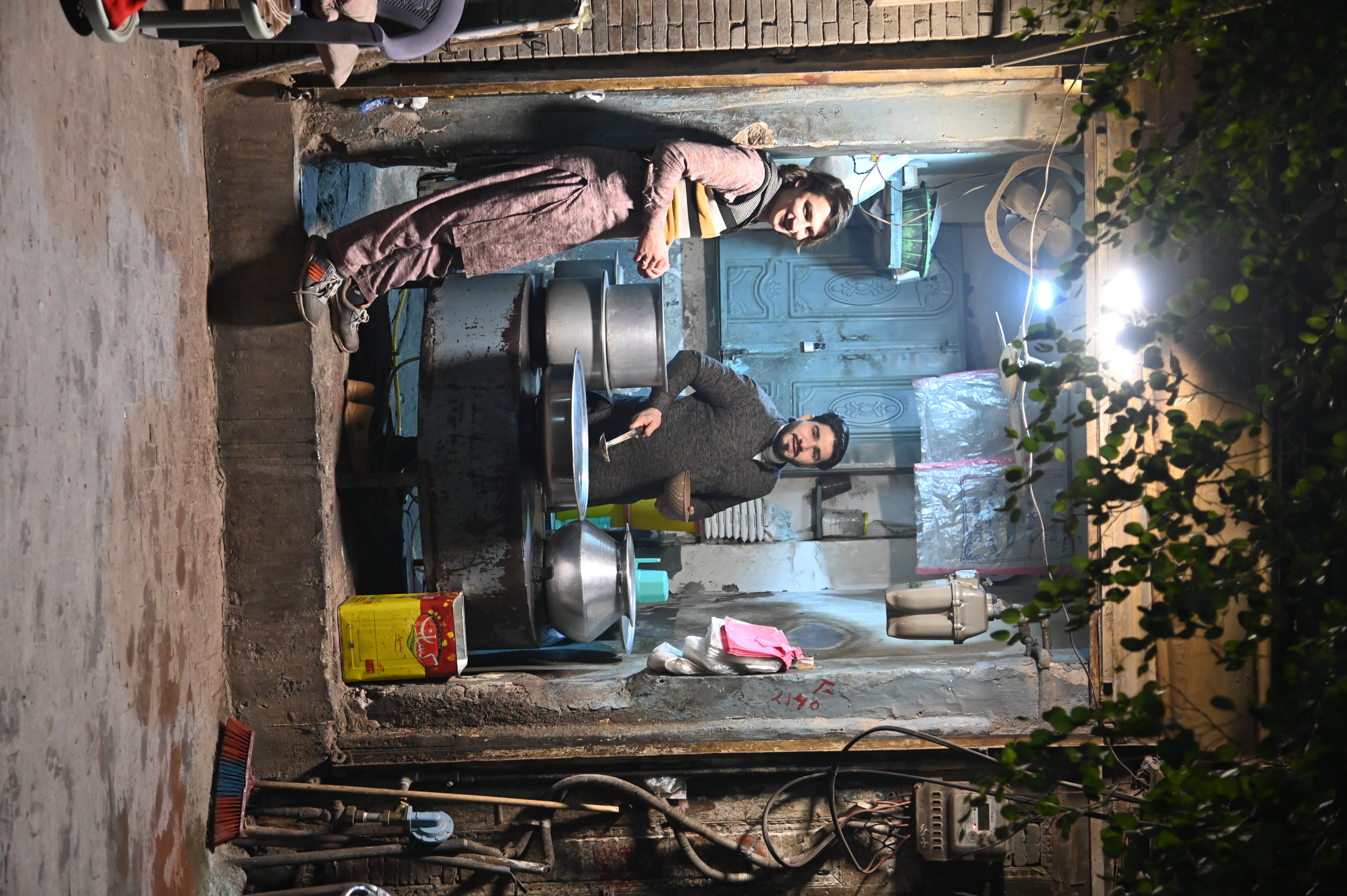 A man selling soup in the local market