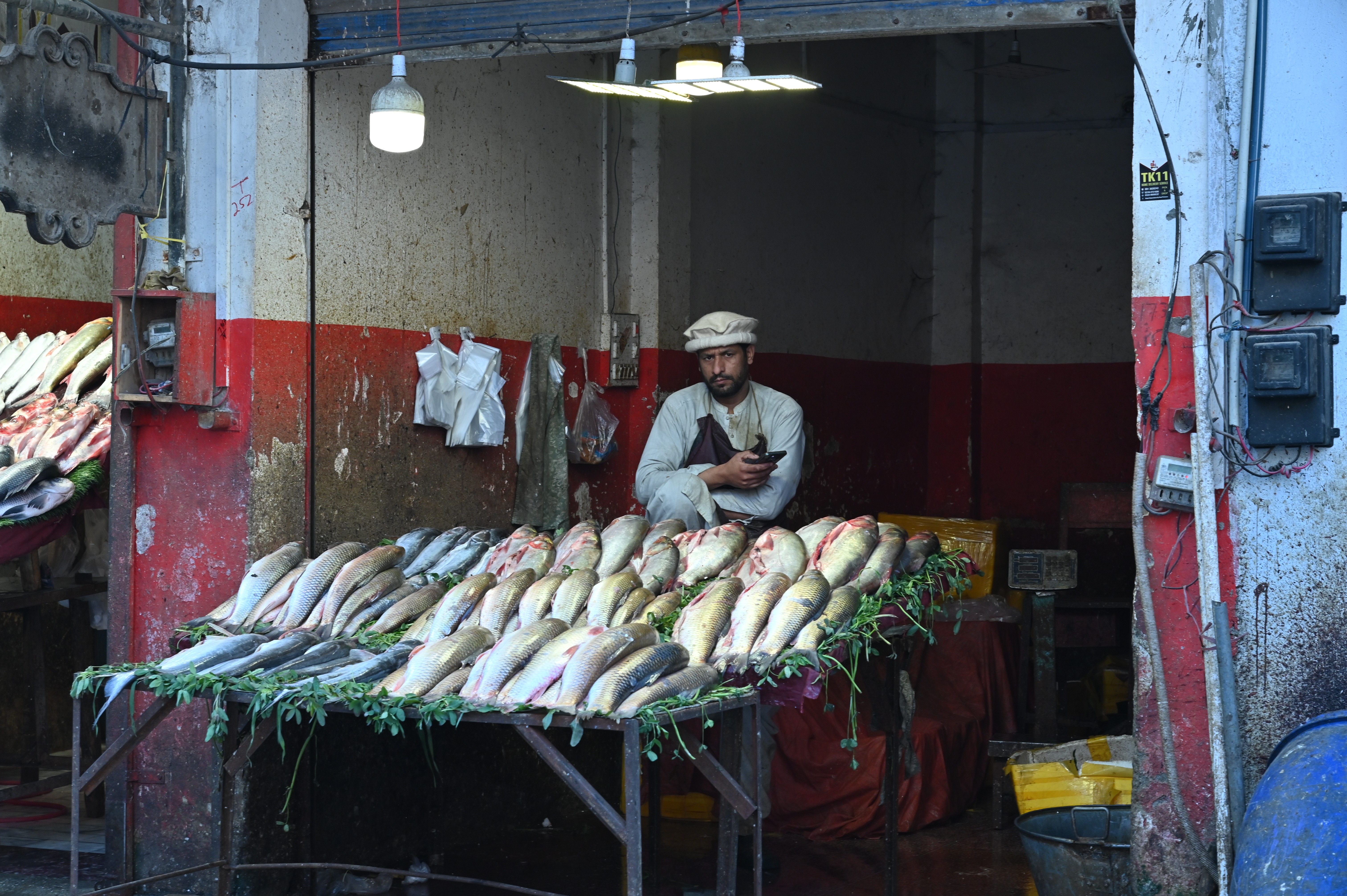 A man selling fresh fish