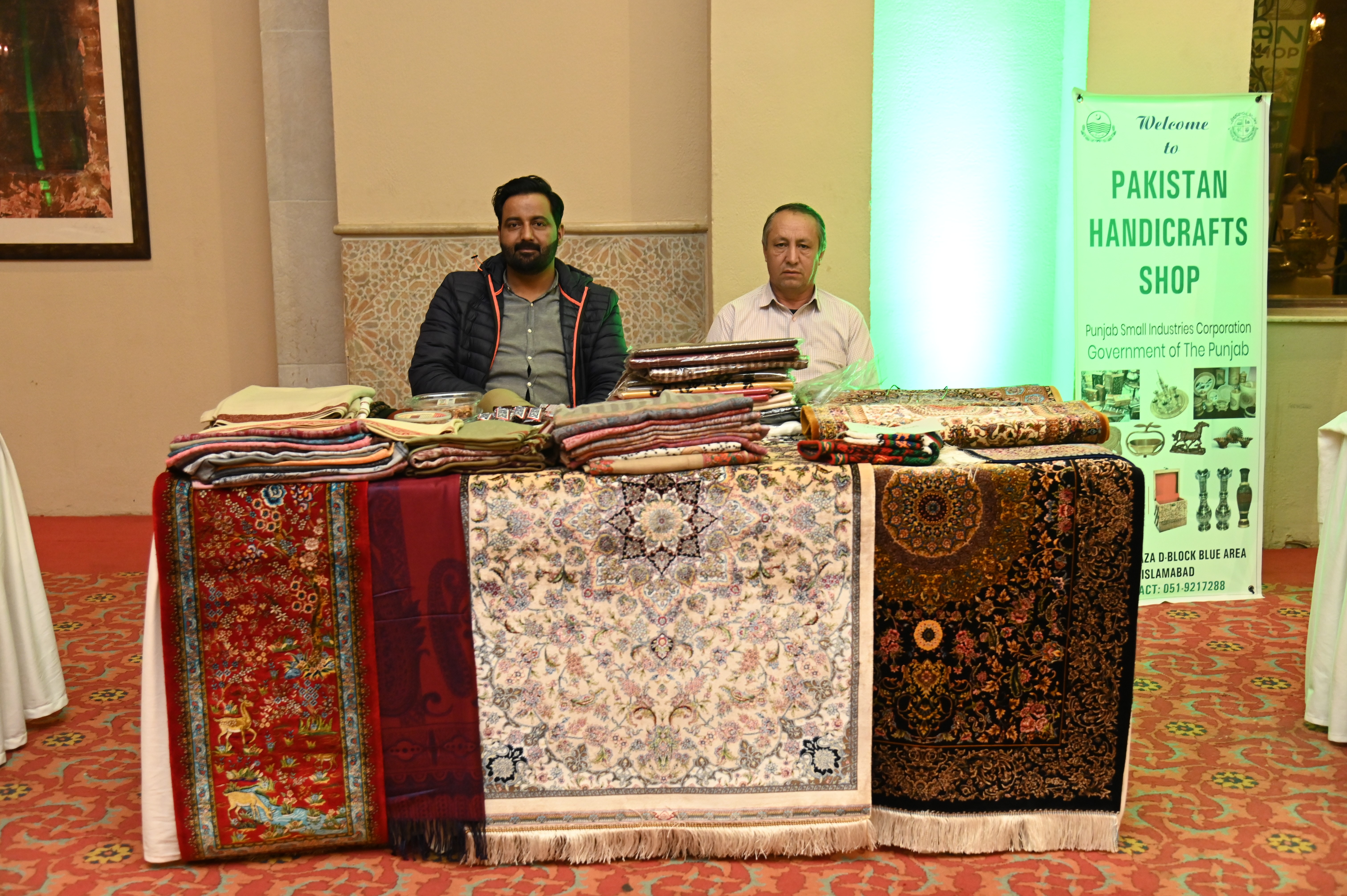 Men selling traditional Shawls and Carpets