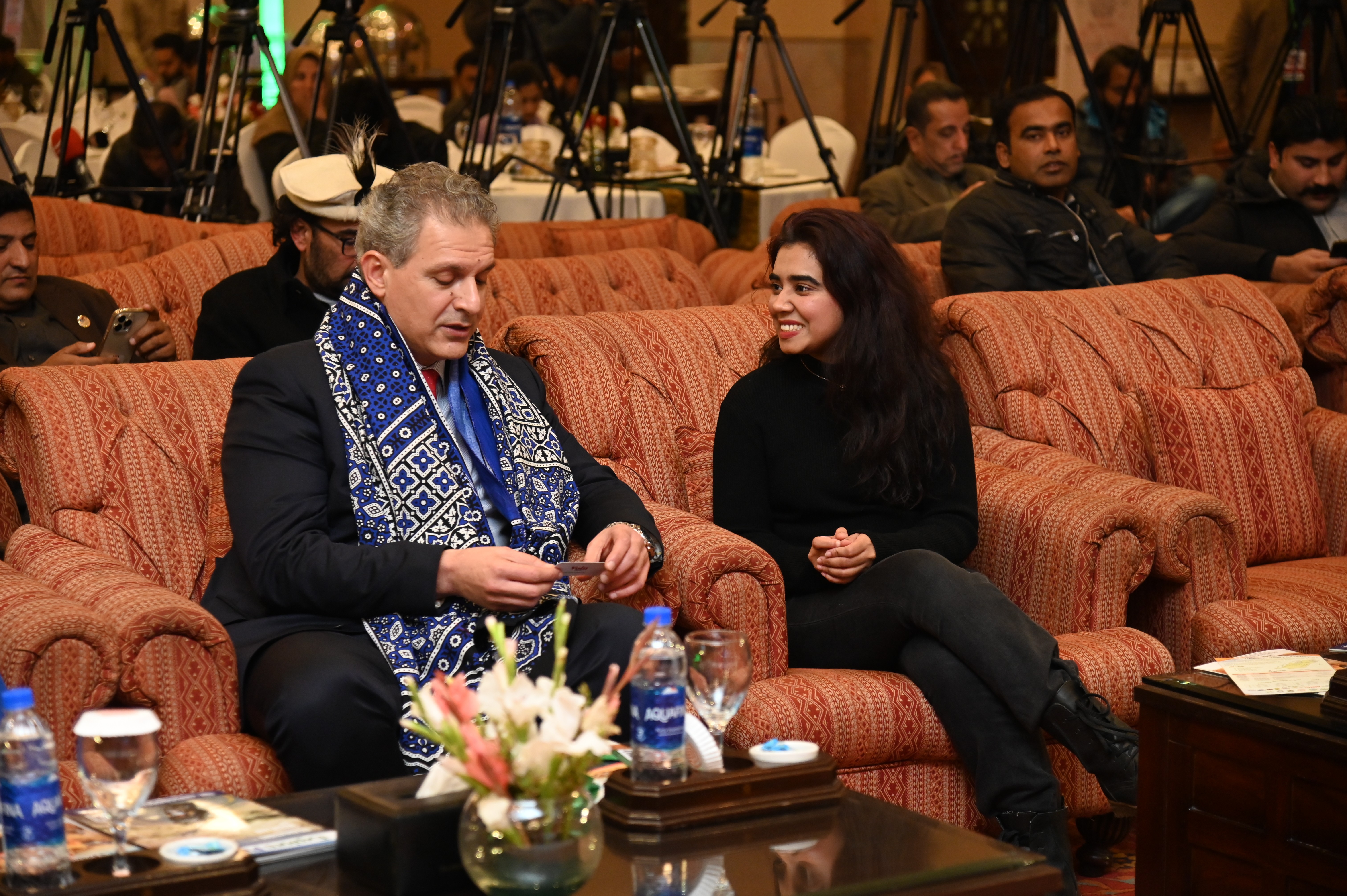 A student talking to the Chief Guests at the The Cholistan Desert Rally & Cultural Festival 2024