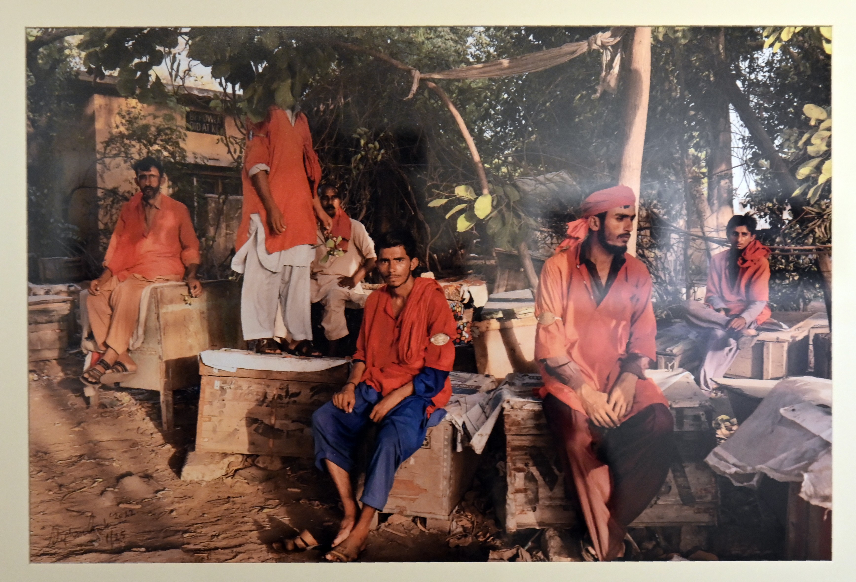 A group photo of Coolie, term used for low-wage labourers, working mainly at the railway station