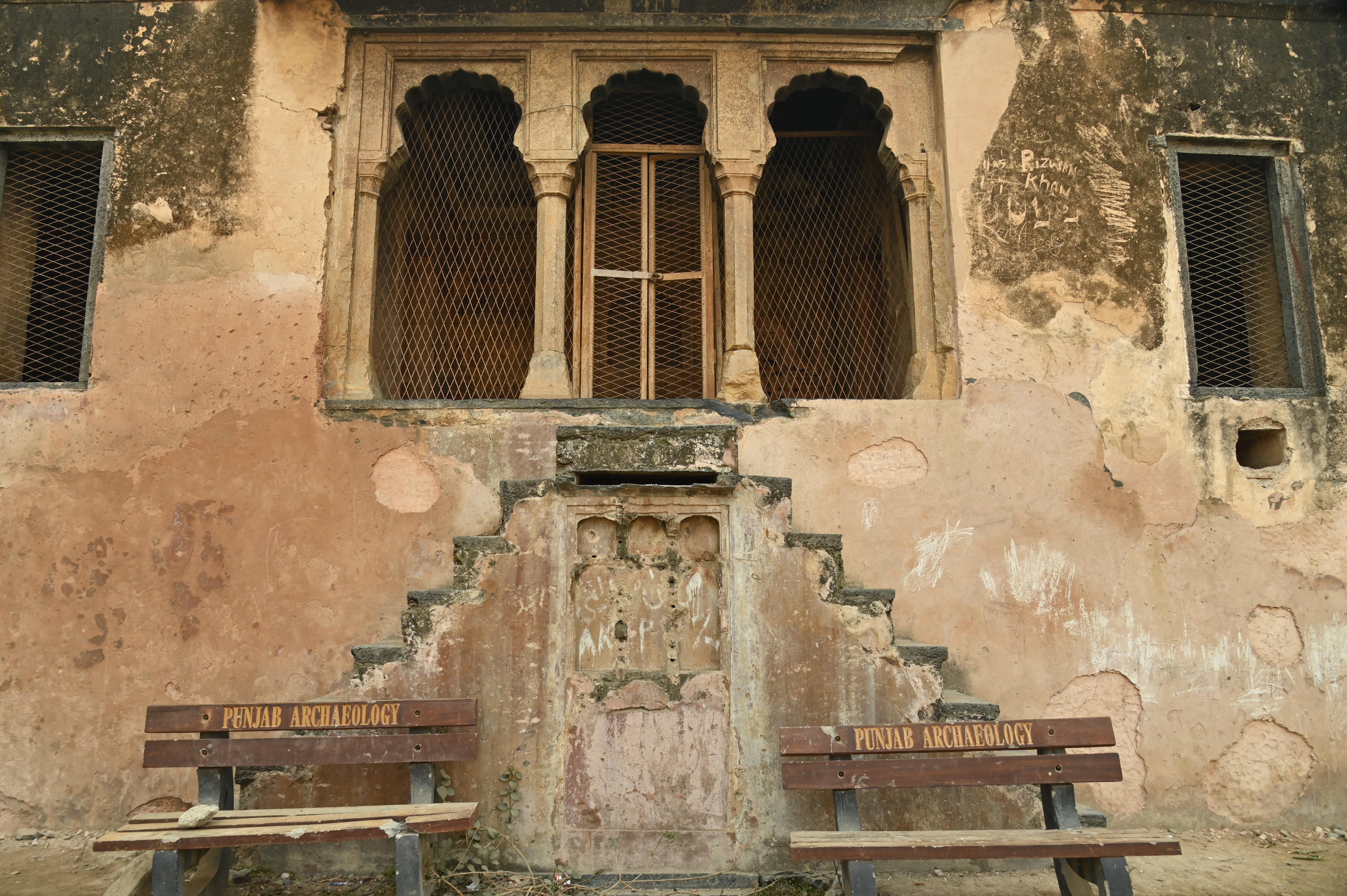 The fading colors of the walls of Behram ki Baradari preserved by The Punjab Archaeology Department under the Antiquities Act 1975 of Pakistan