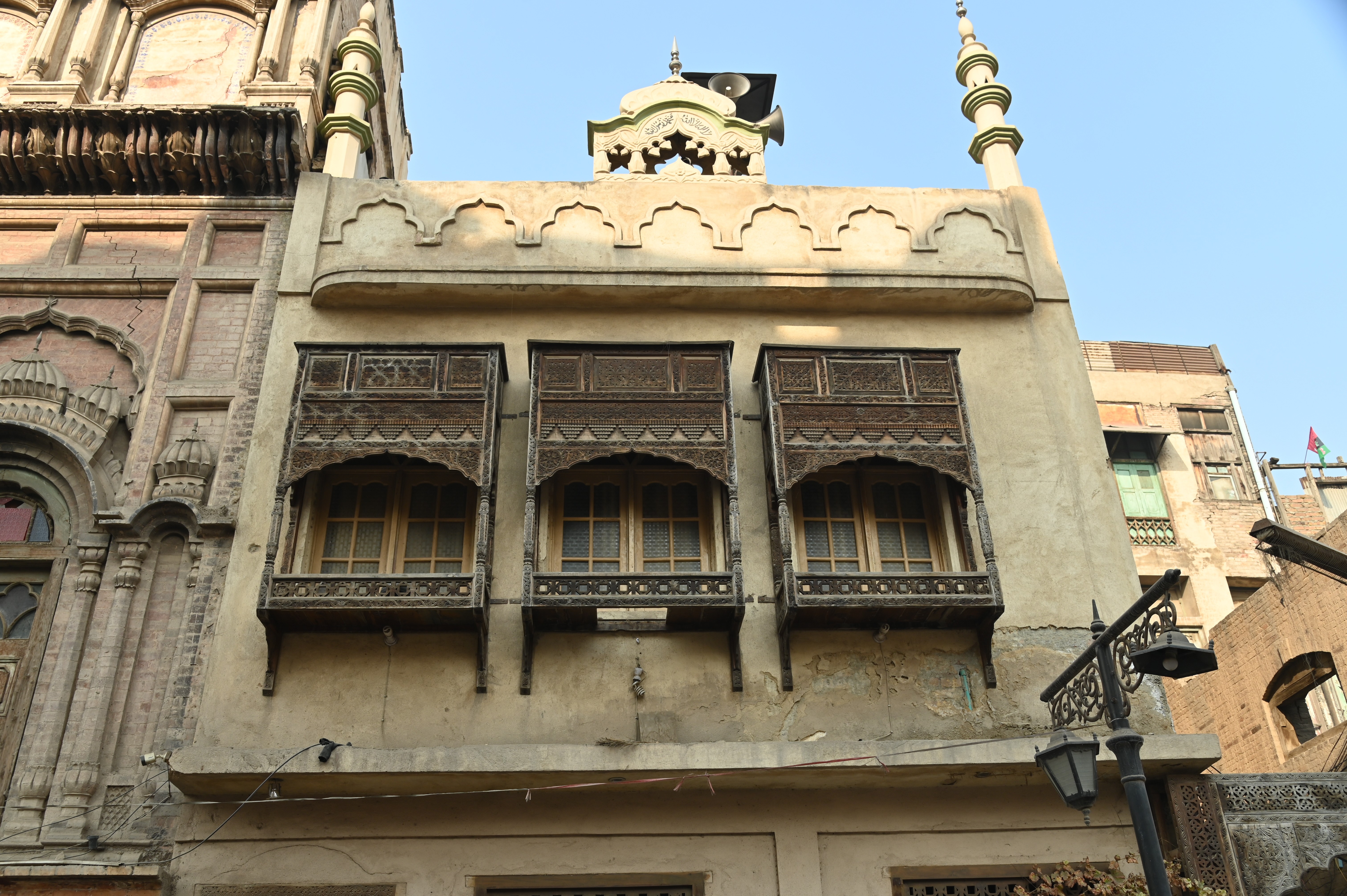 A mosque with wooden windows