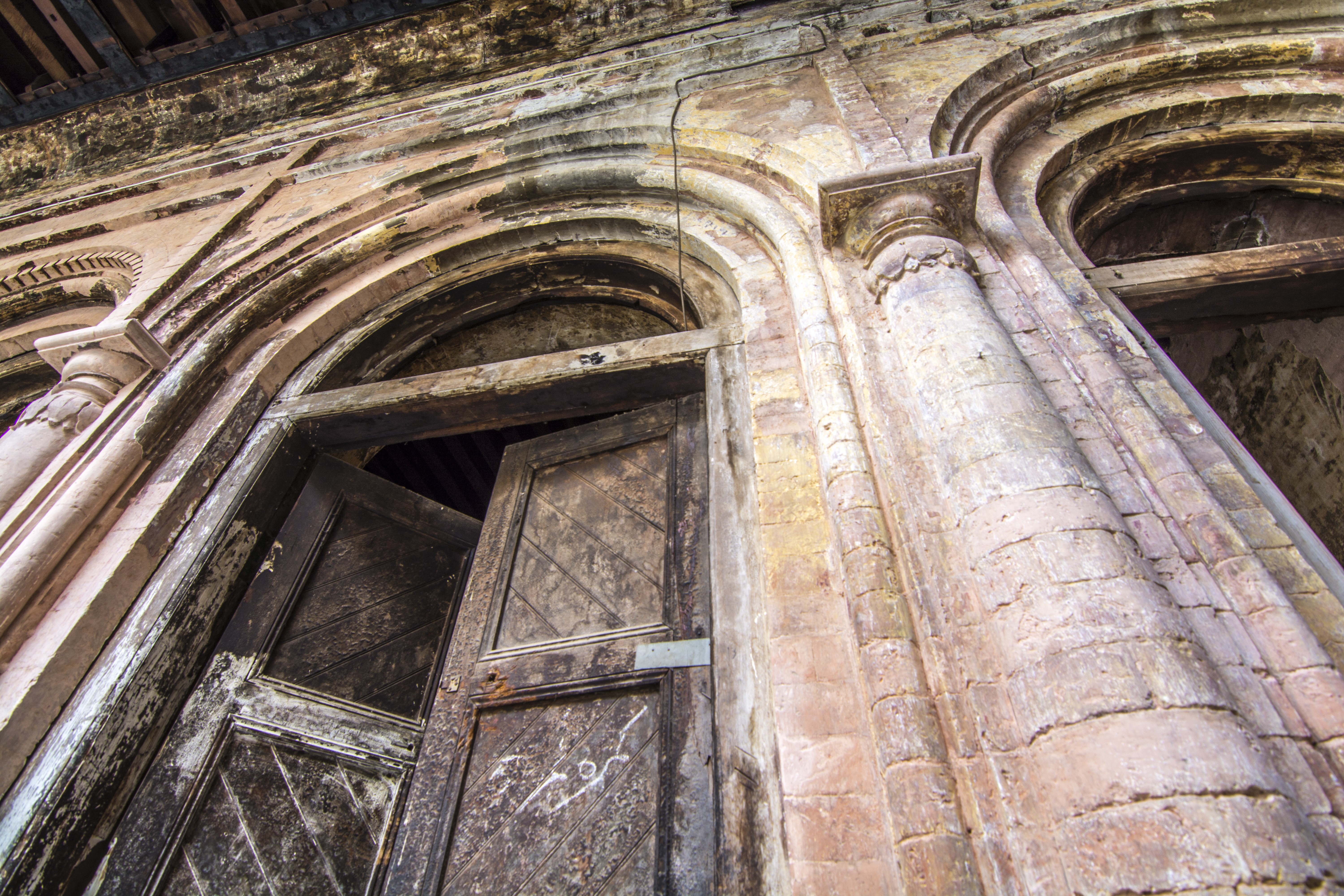 The ancient building with wooden doors