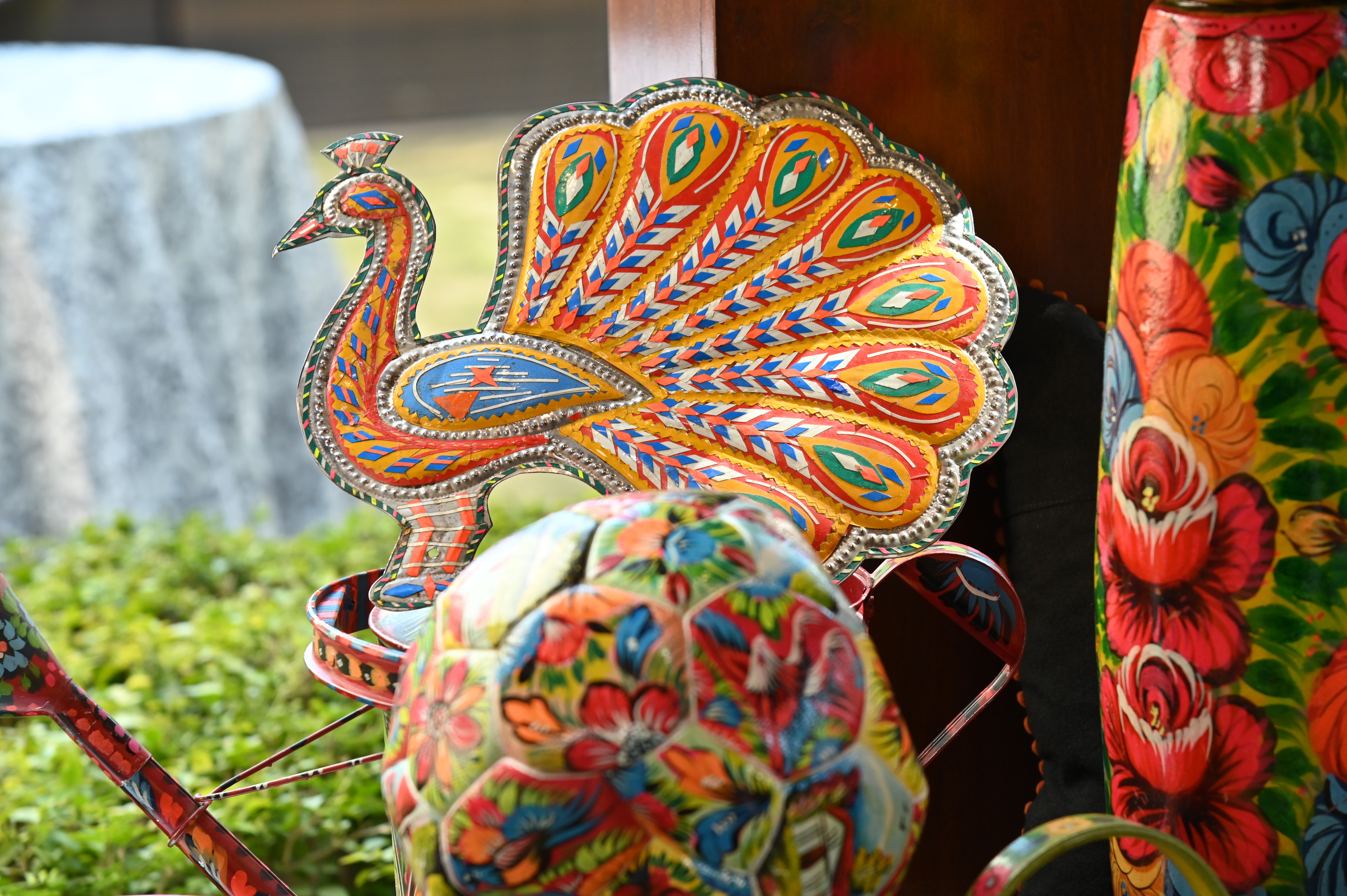 Colorful peacock made on a copper plate