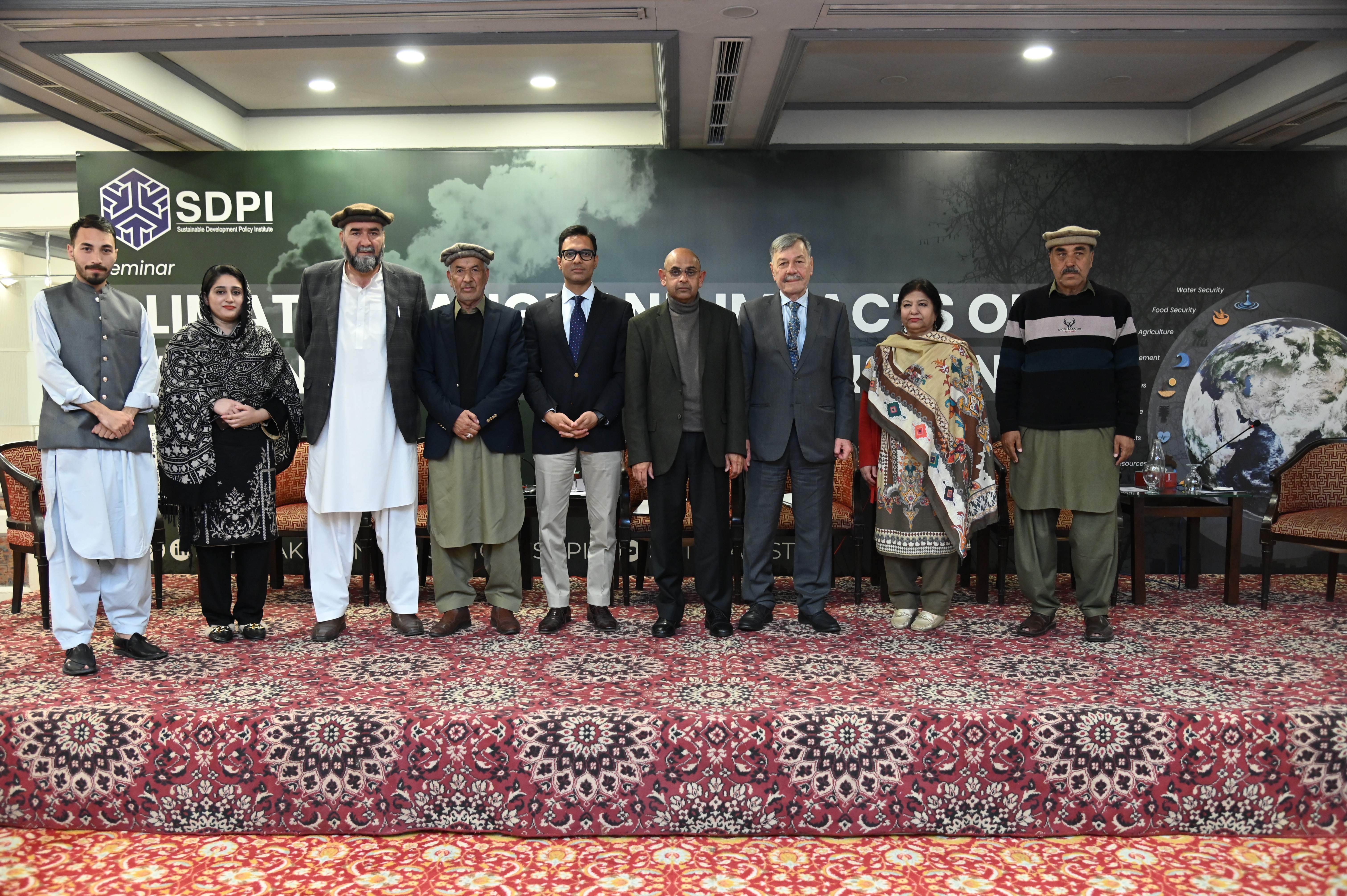 The group photo of the panelists at the climate change conference