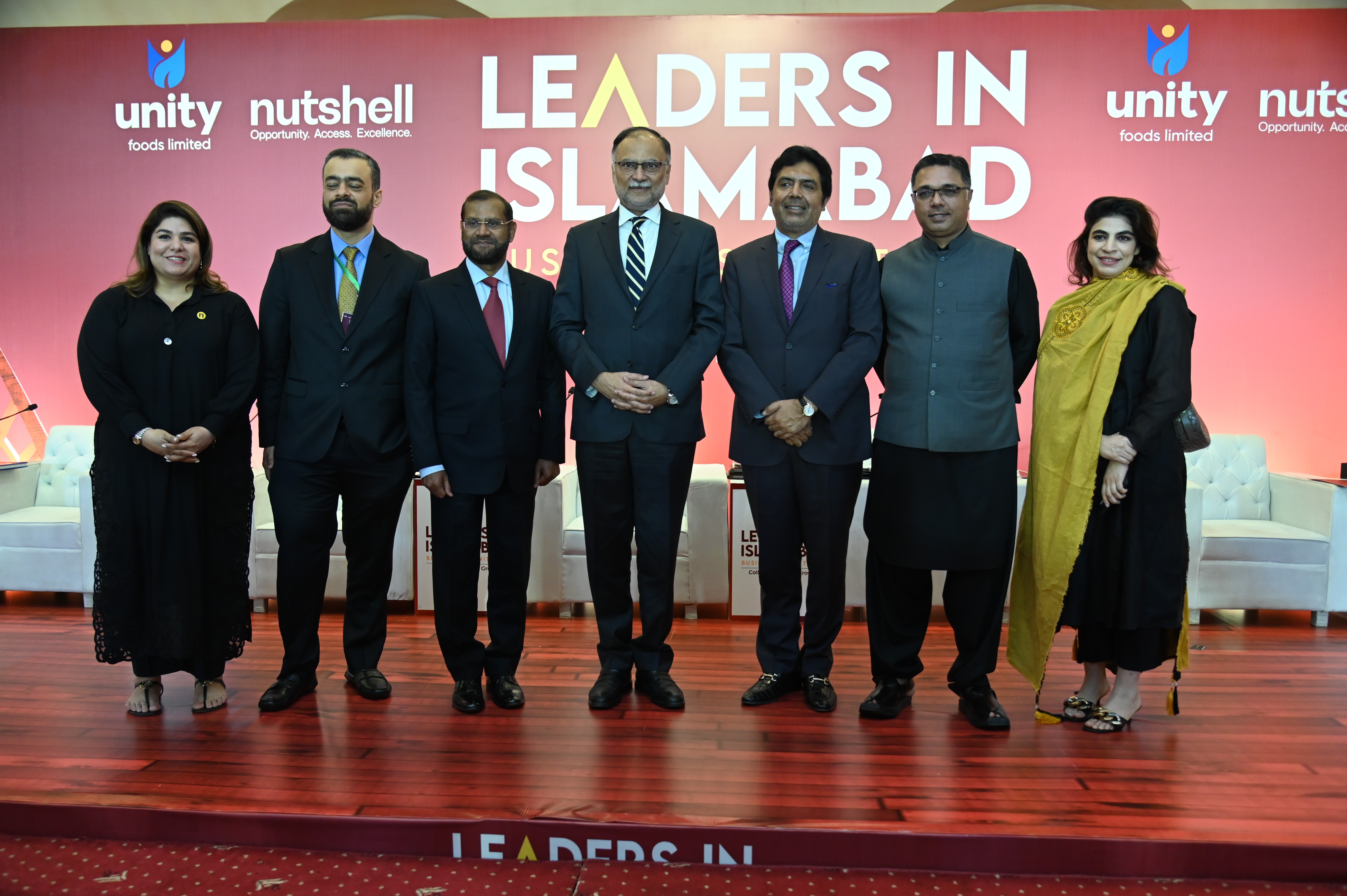 A group photo of The delegates with Federal Minister of planning, development, and special initiatives